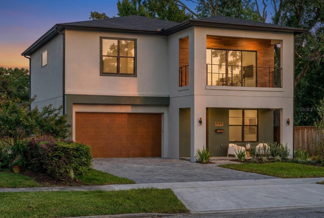 This brand-new College Park home captures everything today’s buyer is looking for. Natural light filters through expansive windows, filling every corner of its nearly 3,100 square feet with warmth and style.A charming front porch sets the tone for what’s inside, modern design with classic neighborhood appeal. The open main floor is anchored by a chef’s kitchen featuring an oversized island, hidden walk-in pantry with beverage fridge, and a clever secondary laundry area. A dedicated office offers the perfect space for remote work or creative pursuits, while a first-floor junior suite with private bath provides flexibility for guests or in-laws. Living and dining areas flow seamlessly toward the covered lanai and pool area.Out back, the pool and pre-plumbed outdoor kitchen set the stage for weekends spent poolside, evening cookouts, and year-round fun in the Florida sun.Upstairs, a bonus loft and balcony provide room to relax or work from home. The primary suite offers a spacious walk-in closet and a spa-like bath with soaking tub and separate shower. Two additional bedrooms, a stylish hall bath, and full laundry complete the second level.Thoughtful design, natural textures, and curated finishes give the home a sense of warmth and sophistication rarely found in new construction.Located within walking distance of Dartmouth Park, Edgewater Drive’s shops and restaurants, Publix, and Starbucks, and just minutes from Downtown Orlando, AdventHealth, Lake Highland Prep, and Bishop Moore High School, this home places you perfectly at the center of College Park living.Move in just in time to celebrate the holidays in a space that feels designed for gathering, connection, and everyday ease.College Park real estate redefined.