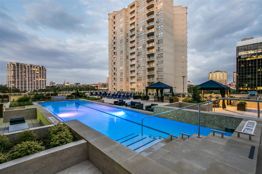 Community pool featuring a gazebo, a view of city, and a patio
