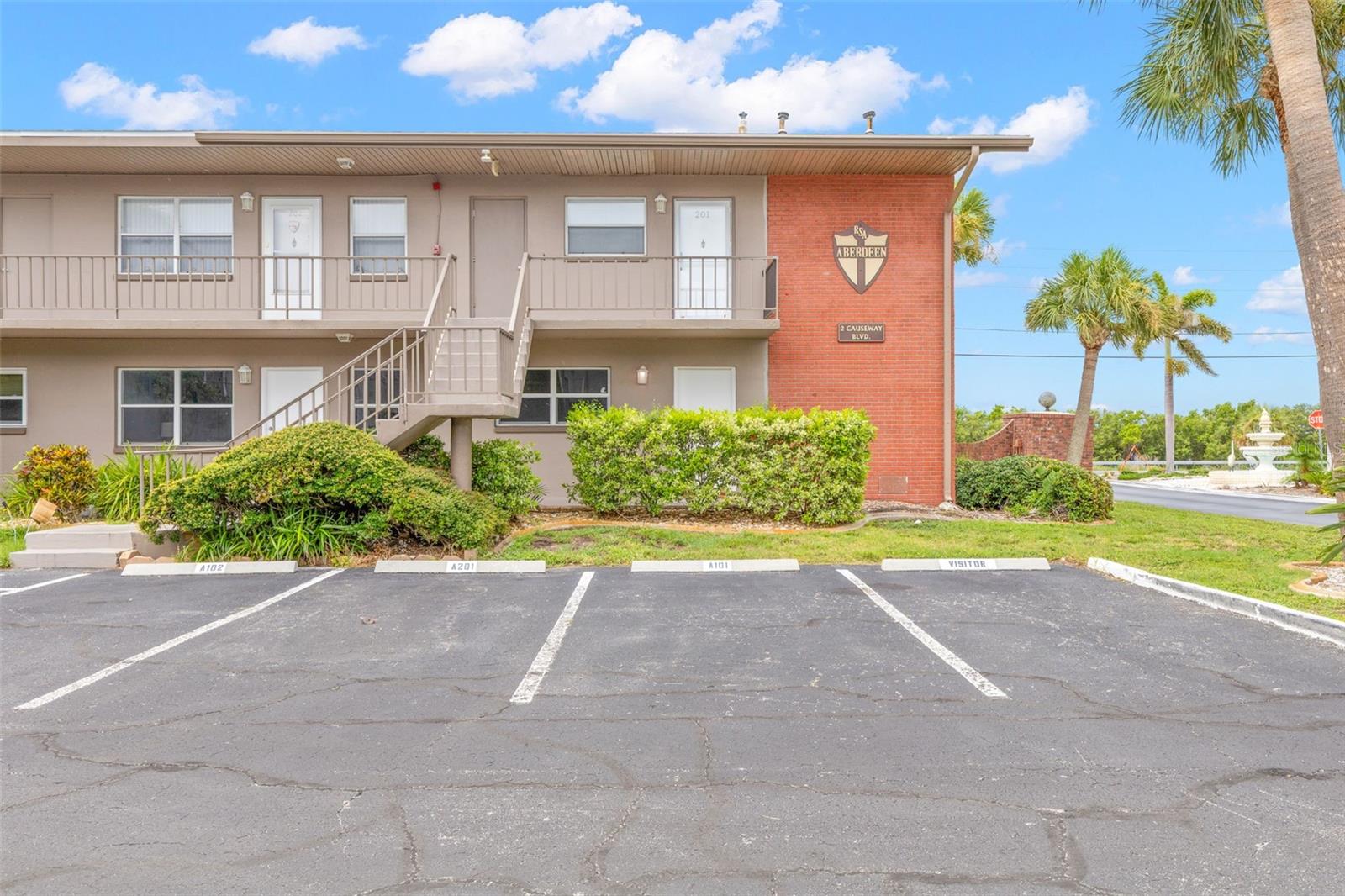 Welcome to coastal living! This beautifully renovated 2-bedroom, 2-bath first-floor corner condo features a bright, open floor plan, luxury vinyl plank flooring, a modern kitchen with shaker cabinets and stainless steel appliances, and a spacious screened porch perfect for relaxing. Ideally located just steps from the Dunedin Causeway and Honeymoon Island, residents enjoy resort-style amenities including a heated waterfront pool, clubhouse, fitness center, fishing pier, tennis and pickleball courts, shuffleboard, bocce ball, barbecue area, and scenic waterfront walking paths. Move-in ready and perfect as a full-time home or seasonal retreat!