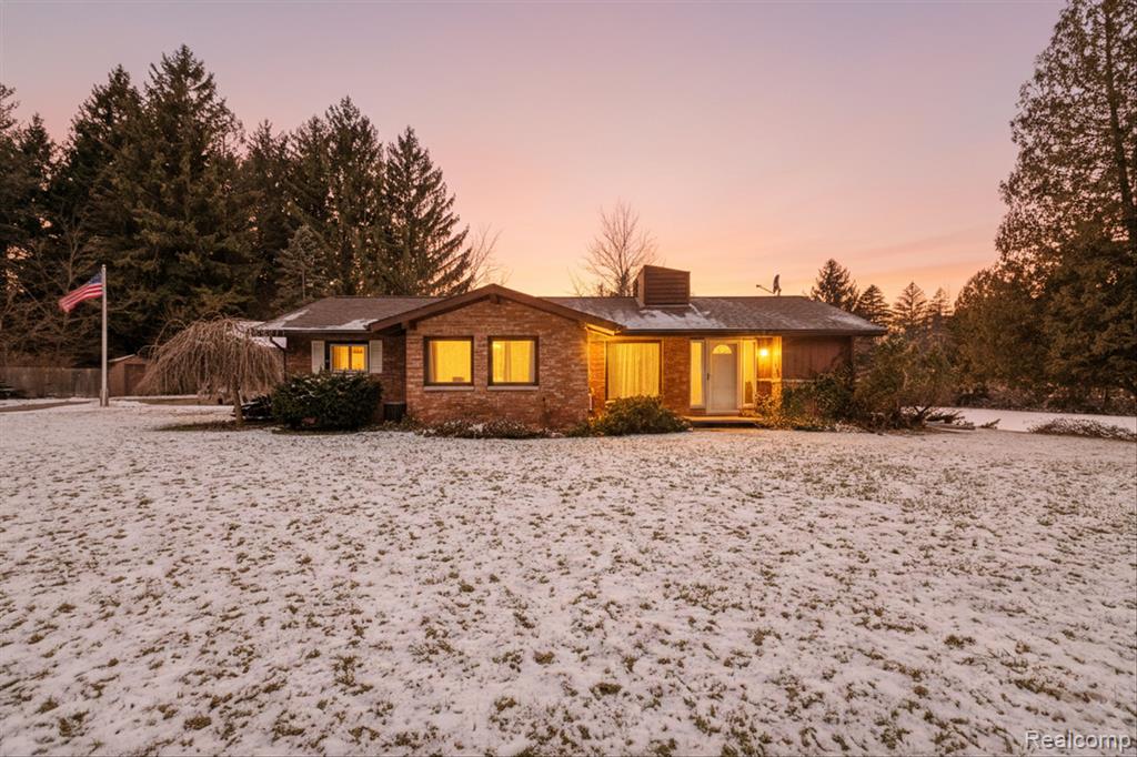 Welcome to your private retreat in Hemlock, Michigan! Nestled on 7.26 scenic acres, this charming 2-bedroom, 1.5-bath home offers the perfect blend of comfort, character, and outdoor recreation. Ideal for hunters, nature lovers, or anyone seeking peace and privacy, the property features a private pond with a dock and swim platform, perfect for fishing, kayaking, or swimming. Inside, enjoy a warm and inviting atmosphere with a natural stone fireplace, open floor plan, and an updated kitchen with butcher block countertops. Recent improvements include updated HVAC and electrical service. The spacious layout comfortably accommodates gatherings and everyday living. Step outside to relax on the covered patio, unwind in the jetted hot tub, or take in the serene views and prime hunting opportunities of the surrounding acreage. Additional highlights include an oversized 2.5-car garage, additional outbuilding/shed, and ample space for storage, hobbies, or equipment. Furniture is negotiable, making this a fantastic opportunity for a turnkey getaway, full-time residence, or recreational property.