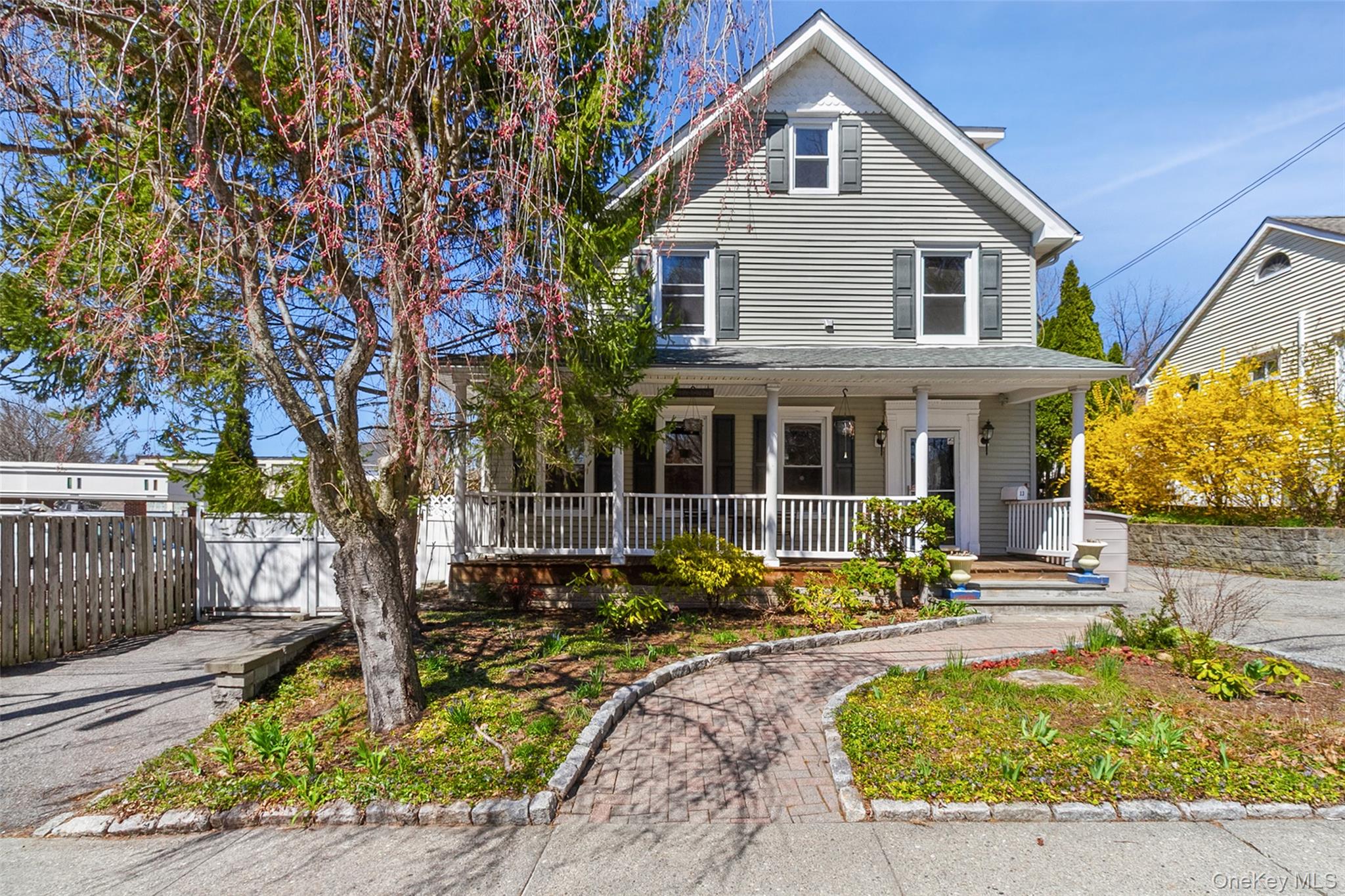 Step into the timeless charm of this classic 1877 Victorian, ideally located just off Main Street in the heart of Mount Kisco. Rich in character and filled with original warmth, this special home offers 3 bedrooms and 3.5 baths, generous living space, and endless potential for someone ready to make it truly shine.The main level features a chef’s kitchen with stainless steel appliances, granite countertops, and a center island, opening to inviting spaces perfect for both everyday living and entertaining. Enjoy a flexible floor plan with a formal living room, formal dining room or family room, and a private office tucked just off the family room—ideal for today’s work-from-home lifestyle.Upstairs, the primary bedroom suite offers a spacious retreat with a large bath, stall shower, separate Jacuzzi tub, and custom cabinetry. A second bedroom, hall bath, and convenient second-floor laundry complete this level. The newly converted legal third-floor bedroom suite with full bath adds a unique and versatile bonus space.The walk-out lower level includes two additional rooms, offering flexibility for recreation, hobbies, storage, or guest overflow. Outside, this home is wrapped in charm with a welcoming front porch, rear porch, and beautiful stone patios, all set within a fully fenced yard. A spacious driveway with room for 5–6 cars adds exceptional convenience rarely found in village living.Just moments from shops, dining, and village conveniences, this is a rare opportunity to own a character-filled Victorian in a highly desirable location. With its gracious layout, period appeal, and room to enhance, this home is ready for its next chapter.