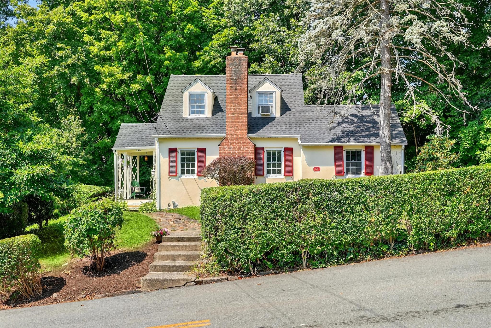 Welcome to this charming Cape Cod gem, perfectly situated in a serene neighborhood that seamlessly blends tranquility with convenience. Just a brief stroll away, you'll find local shops and the Metro North train, providing a quick 36-minute ride to Manhattan. Plus, enjoy easy access to major highways for all your adventures.
Step inside to discover a warm and inviting first floor, featuring a cozy living room with a wood-burning fireplace, a dining area with counter seating for two, and a well-appointed kitchen boasting brand-new stainless steel appliances and granite countertops. The first floor also includes a bedroom with a convenient half-bathroom. 
Venture upstairs to find a spacious oversized bedroom, which offers the potential to be divided into two separate rooms, and a full bathroom that caters to all your needs. 
Outside, your personal oasis awaits with a stone patio perfect for entertaining, a flat grassy area, and ample space for gardening. The freshly painted interiors and hardwood floors throughout create a bright and welcoming canvas ready for your personal touch.
Additional features include a Tesla charger and a new oil tank. Don't miss the opportunity to make this delightful home your own!
