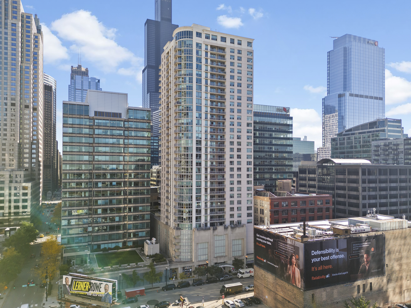 Welcome to 125 South Jefferson Street, Unit 1804, right here in the heart of Chicago!  Offering over 1,200 square feet of living space, this beautifully refreshed unit features brand-new stainless steel kitchen appliances, including a refrigerator, dishwasher, and microwave, complemented by freshly painted cabinets and a brand-new backsplash.  You'll also find brand-new faucets in both bathrooms, a brand-new washer and dryer, and luxury vinyl flooring throughout the entire unit, creating a modern, cohesive feel from room to room.  Situated in a 33-story building featuring 264 residential units, you'll enjoy the excitement of high-rise Chicago living. And the best part? Your fur-babies are welcome too, making this a place that both you and your four-legged companions can call home!    **ASSIGNED GARAGE SPACE INCLUDED IN PRICE**
