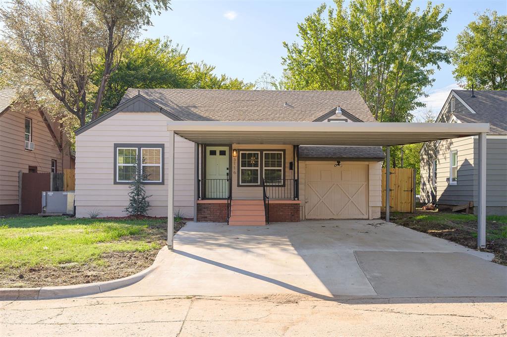 New Roof • New Windows • New Oversized Carport & Driveway • New Privacy Fence • Granite Countertops • New Stainless Steel Appliances • Two Living Areas • Storm Shelter • Covered Patio • Storage ShedCharming Renovated Cottage with Two Living Areas! This 3 bed, 2 bath home sits on a tree-shaded lot just west of May Ave, with a new oversized carport over the new driveway and a covered front porch. Hardwood floors run through the living room, dining room, and both main-level bedrooms. The living room has a tile-surround fireplace mantel, crown molding, and an arched opening into the dining room with a modern geometric chandelier. The kitchen features sage green cabinetry with new hardware, granite countertops, white subway tile backsplash, a pull-down faucet, a pass-through to the dining room, and new stainless steel appliances including a gas range, microwave, dishwasher, and refrigerator. The second living area is a large den with knotty pine paneling, a full brick wall with a fireplace and raised hearth, built-in shelving, and a wall of windows overlooking the backyard. Upstairs, the third bedroom has new carpet, built-in shelves and drawers, and closet storage. The hall bath has a tub/shower combo and the second bath has a walk-in shower next to the laundry room. Fresh interior paint and new plumbing and lighting fixtures throughout. Out back: a covered patio, a storm shelter, a storage shed, and a large backyard enclosed by a new wood privacy fence. Schedule your showing today!