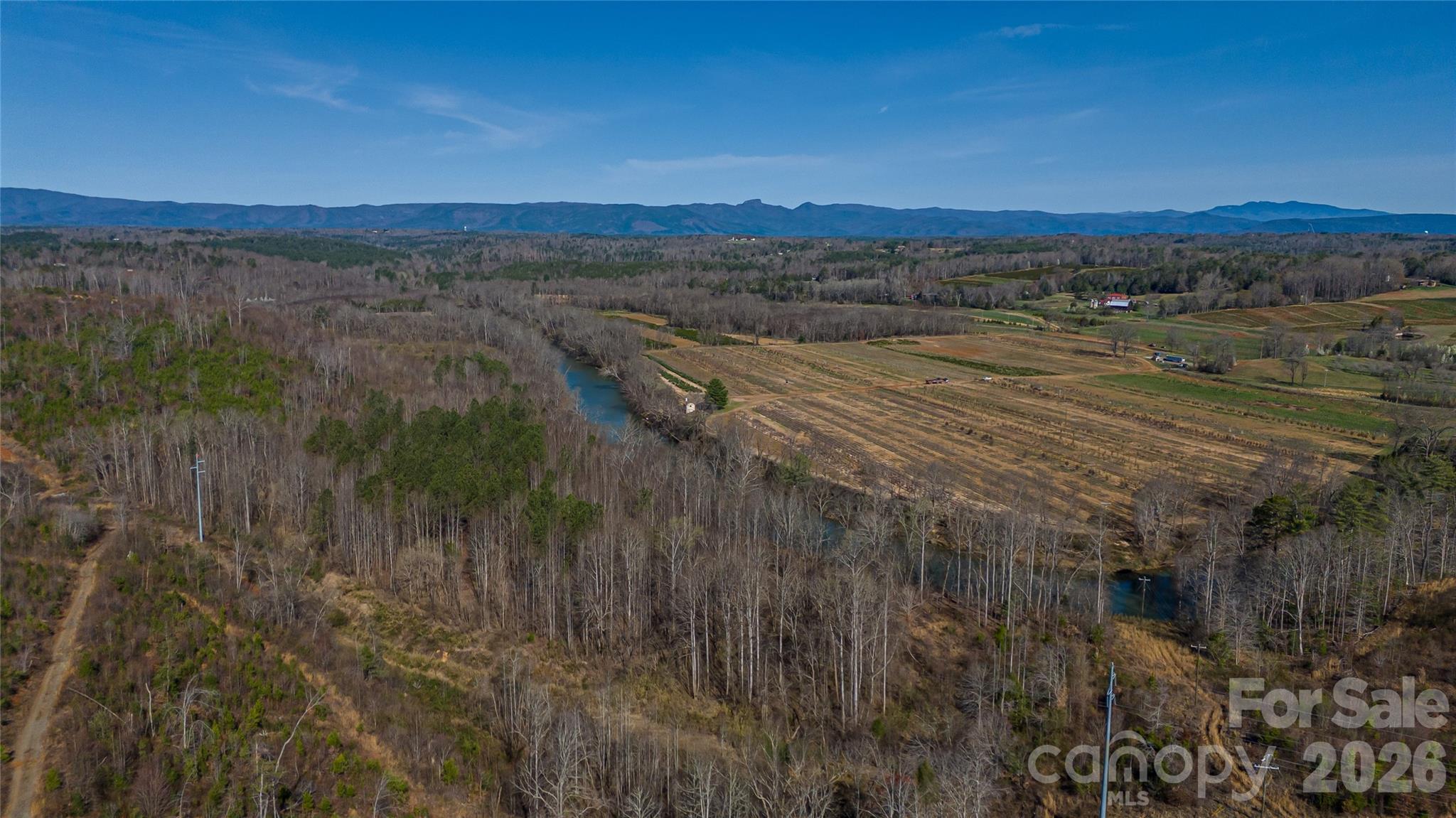 Attention Developers, take a look at this hard to find approx 77 acres of rolling topography within minutes of downtown Morganton or Glen Alpine or Beautiful Lake James. This property offers approx 1280' of paved road frontage on Hwy 70 and approx 2100' of river frontage with amazing long range views of Table Rock and Shortoff mountains. This could be your own private estate or multi housing community. Tons of possibilities! Call today for a private showing. Buyer agents welcome. $1,150,000