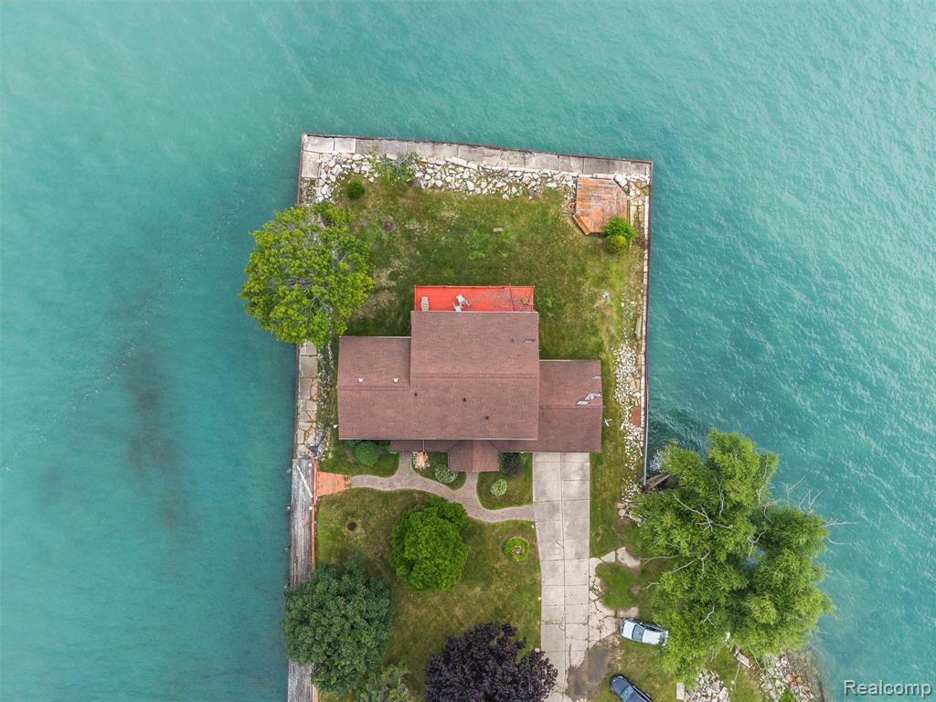 ONCE IN LIFETIME OPPORTUNITY !!! Value is the land !! the house is circa 1980's (access to house with accepted offer) Bring your builder or Cranbrook homes architect is ready to meet! BEST LOT ON LAKE ST CLAIR! Walking distance in vibrant New Baltimore downtown! Home includes a 50' Boat well!!
Don't miss this one!!  DO NOT WALK THE PROPERTY WITHOUT PERMISSION!! POLICE WILL BE CALLED