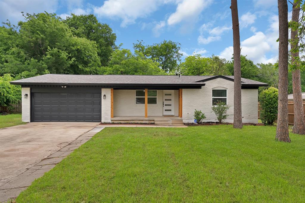 Fully renovated home on a quiet cul-de-sac! This 3 bed, 2 bath gem sits on a large, tree-lined lot and has been transformed top to bottom with modern finishes. The open-concept living and kitchen area features luxury vinyl plank flooring, recessed lighting, and a dramatic oversized island with quartz countertops. White cabinetry, subway tile backsplash, and sleek pendant lighting complete the kitchen. The primary suite offers a walk-in closet, walk-in shower with built-in niche, and quartz vanity. French doors open to a generous backyard surrounded by mature trees. Modern curb appeal with cedar accents and a covered front porch. THIS HOME QUALIFIES FOR GRANTS 5K-10K!