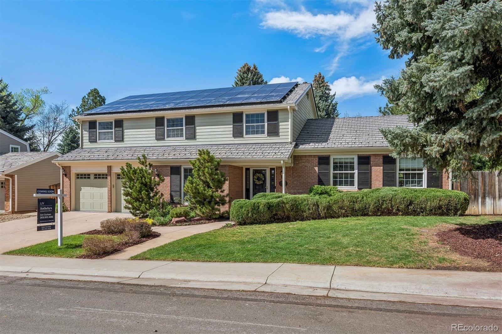 Nestled on a quiet street in the highly sought-after Homestead community, this elegantly renovated 5-bedroom, 4-bath home offers exceptional space, timeless style, and is truly move-in ready. Just a short walk to award-winning Homestead Elementary, three resident-only pools, tennis courts, and nearby open space with scenic walking trails, this home combines an outstanding location with an exceptional lifestyle.A welcoming foyer is flanked by a private home office and a stunning formal living room with cathedral ceilings and abundant natural light. This thoughtfully crafted home offers exceptional space for both everyday living and effortless entertaining. The expansive main floor features two inviting family rooms, a formal dining room, and a beautifully updated kitchen with quartz counter tops, custom cabinetry, hidden appliance storage, and a sunny breakfast nook.Upstairs, the luxurious primary suite features a spa-inspired five-piece bath with dual vanities, soaking tub, and walk-in shower. A guest suite with an en-suite bath, three additional bedrooms, a hall bath, and a convenient laundry chute, provide exceptional functionality for family living. The finished basement adds flexible living space along with two generous storage rooms.Set on a beautifully landscaped quarter-acre lot, the private backyard is an inviting retreat. Featuring a pergola, flagstone patio, and raised garden beds, this home is perfect for outdoor dining, entertaining, gardening, or relaxing on crisp Colorado evenings.Additional premium features include skylights and solar tubes, a DaVinci roof with SOLARHIDE® underlayment, an EVSE Tesla charger, and fully paid-off solar panels.Luxury, comfort, and an exceptional neighborhood life