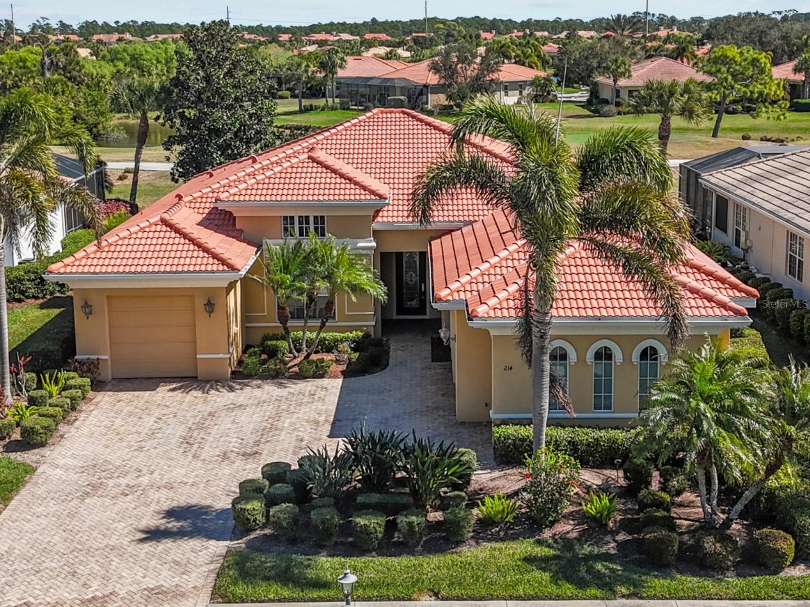 Perfectly positioned along the golf course, this elegant pool home offers refined Florida living in one of Venice’s most sought-after communities. A brand-new roof installed in September 2025 provides immediate value and peace of mind.Inside, you’ll find formal living and dining spaces, soaring ceilings, and refined architectural detailing that create a sophisticated yet welcoming atmosphere. Expansive pocketing glass doors fully retract to open the home to the spacious screened pool area overlooking the manicured fairways—creating a seamless indoor-outdoor experience that truly embraces the Florida lifestyle.The kitchen serves as the heart of the home and features natural gas for cooking. The kitchen opens to the family room, making it ideal for entertaining or everyday living. The open floor plan provides both comfortable gathering spaces and an effortless flow.The primary suite is a private retreat with French doors leading to the pool, a tray ceiling with crown molding, abundant windows inviting natural light, dual walk-in closets with a custom organizer, a soaking tub, walk-in shower, and dual vanities.A split-bedroom layout places two generously sized guest suites on the opposite side of the home, providing privacy for family and visitors.Meticulously maintained and move-in ready, the property also offers a two-car garage plus a separate single-bay garage—perfect for your golf cart or additional storage.Residents enjoy access to the clubhouse amenities, while golf membership is optional and available for an additional fee. The Tuscan-inspired clubhouse offers fine and casual dining, six Har-Tru tennis courts, three pickleball courts, a state-of-the-art fitness center with professionally led classes, a three-lane lap pool, resort-style pool and spa, and a poolside Tiki bar. Nature lovers will appreciate the 74-acre park with scenic boardwalk trails for wildlife and birdwatching. Golf enthusiasts may choose to join the 18-hole, par-72 championship course designed by Chip Powell.This gated community is conveniently located near shopping and just minutes from the beaches of Venice Island and Casey Key, this home delivers luxury, lifestyle, and location in one exceptional offering.