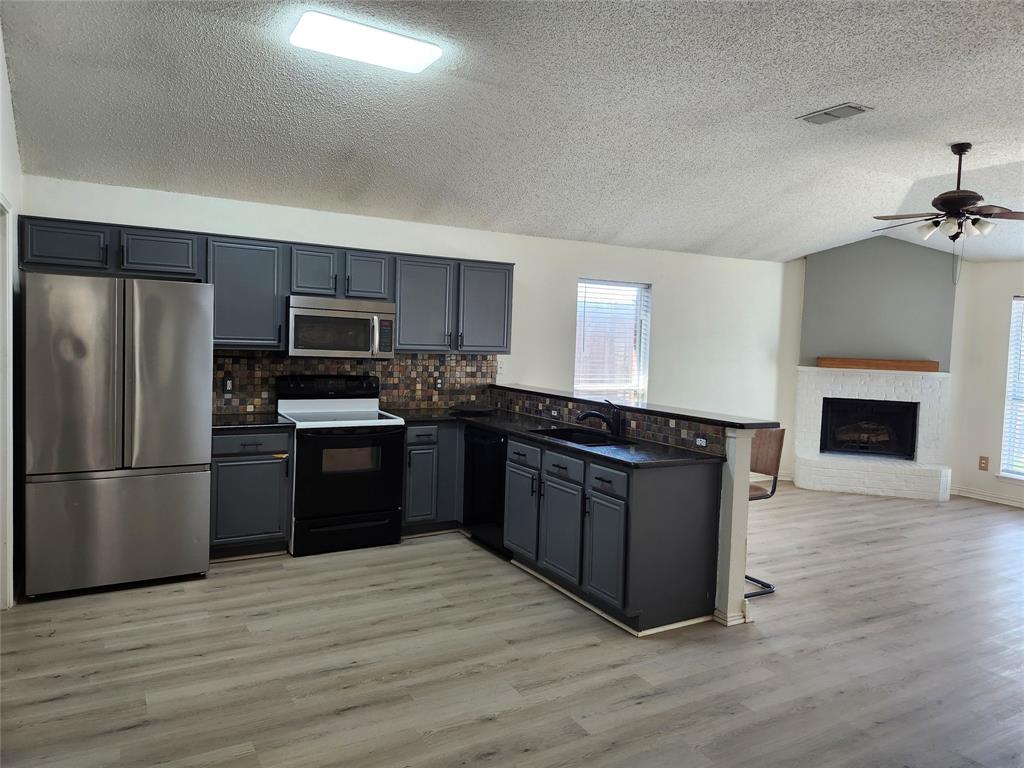 This 4-bedroom, 2-bath home offers both space and convenience, located just minutes from the heart of downtown Fort Worth. Inside, you’ll find laminate flooring throughout, high ceilings, sleek black granite countertops in the kitchen, and a cozy woodburning fireplace that anchors the living area. HVAC and Waterheater replaced within the last 2 years. With its generous layout, abundance of natural light, and excellent location, this home is full of potential. It could use a little polishing and touchups, making it a great opportunity to add your personal touch and create the perfect space to call your own.