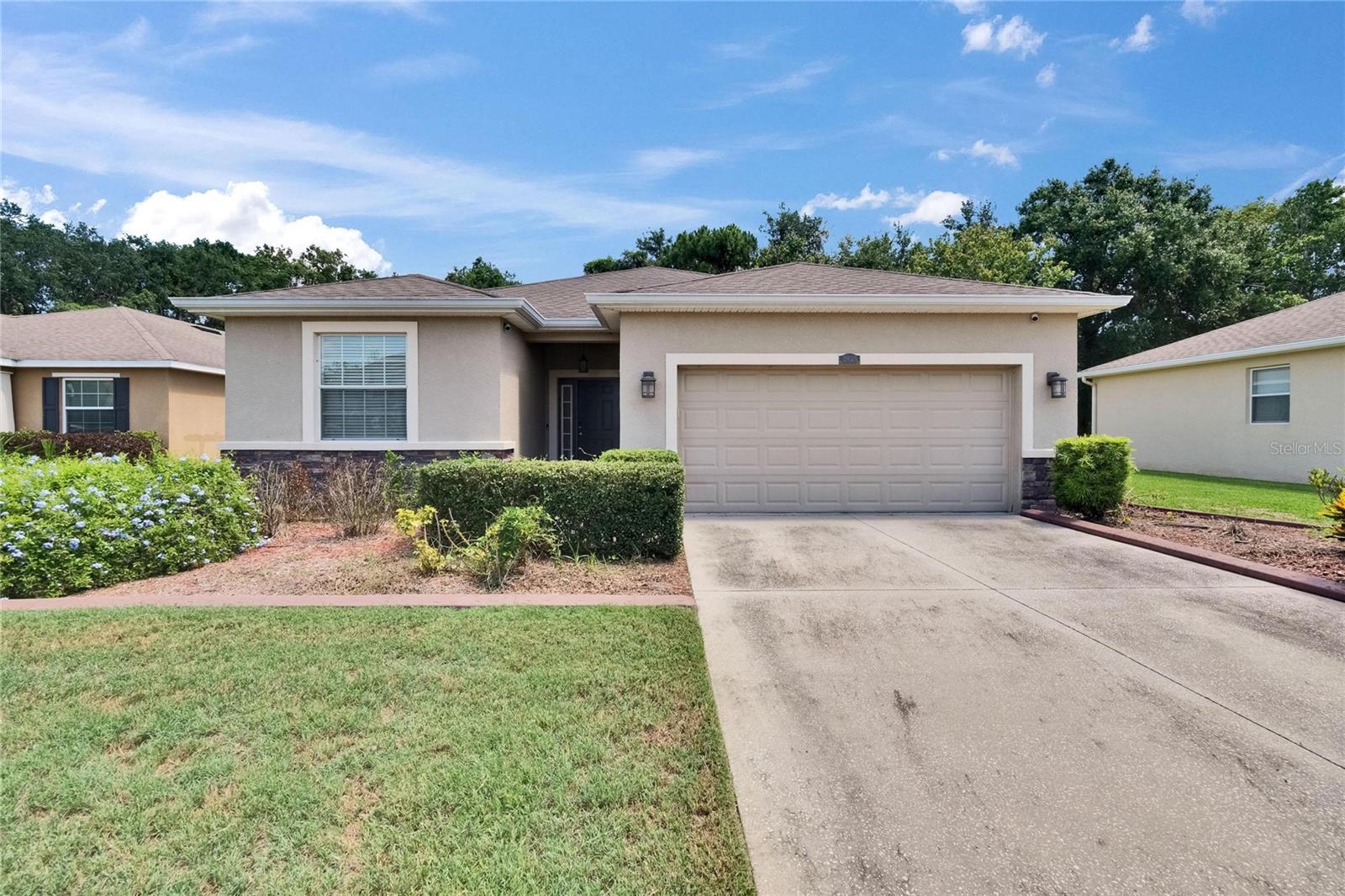 Welcome to Whispering Woods, conviently located close to shopping and easy access to I4 and Rte 60. This wonderful 4 Bedroom 2 1/2 Bath home that backs up to conservation area and sits on a cul-de-sac. This home has a wonderful open floor plan with a modern Kitchen with granite countertops and walk-in pantry overlooping a great room and dining area. The Great Room features a Built-in Bookshelf with an area large enough for a good sized tv and equipment. The Primary Bedroom had dual walk-in closets, a soaking tub, and tiled shower. The other 3 bedrooms are amply sized where the 4th Bedroom being currently used as an office. Walk through the French Doors out to the large screened lanai overlooking the private conservation area. This lovely home is ready for you!