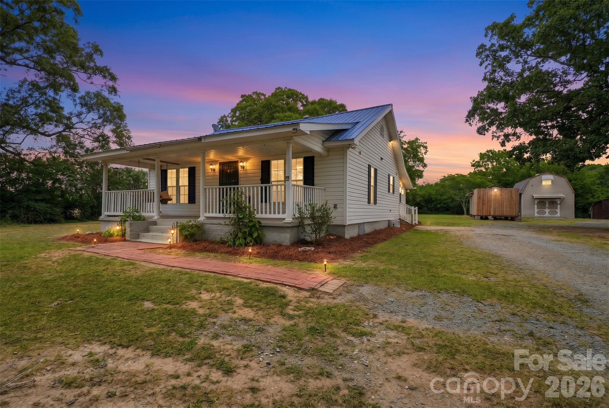 Tucked away on 1.8 acres in the country, this classic farmhouse offers the kind of space and flexibility that’s getting harder to find. The 3-bedroom, 2-bath home is full of character and sits on a beautiful lot with room to spread out, garden, work, or simply enjoy a little slower pace of life.Outside, you’ll find a 24x16 wired shop perfect for hobbies, storage or woodworking along with an 18x25 wired carport featuring a concrete floor. Whether you’re looking for a homestead feel, room for your toys and tools, or just some elbow room outside the city, this property has plenty of potential and practical features to make it your own. Country living without being too far from town.