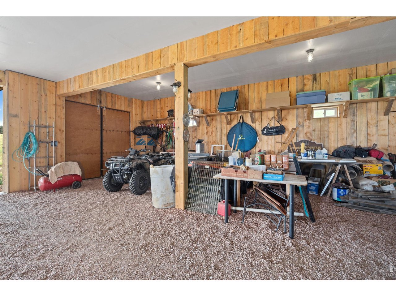 Experience true Colorado freedom with this one-of-a-kind off-grid barndominium set on 73.5 private acres across two parcels (35 acres and 38.5 acres). Whether you're seeking a year-round residence, weekend retreat, hunting basecamp, or equestrian property, this custom-built home offers endless possibilities in a quiet, secluded setting surrounded by stunning mountain views. Designed to maximize the scenery, most of the living space is located on the second floor, where abundant natural light pours through large windows and opens to a massive second-story deck with breathtaking 360-degree views. A spacious 360-square-foot sunroom provides the perfect place to relax and enjoy the landscape in every season. The thoughtfully designed interior features warm finishes, a cozy wood stove, and extensive storage throughout. Built for self-sufficient living, the property is powered by solar energy and served by a private well and propane system. The impressive 60' x 40' barndominium also includes a large workshop, offering ample space for projects, equipment, vehicles, and recreational gear. Horse enthusiasts will appreciate the equestrian setup, complete with a tack room, three interior stalls, and additional covered stall space. A greenhouse extends your growing season, while the expansive acreage provides room to ride, explore, and potentially expand. With plenty of space to add on and create your dream mountain retreat, this rare property combines privacy, functionality, and spectacular views in an unforgettable setting.