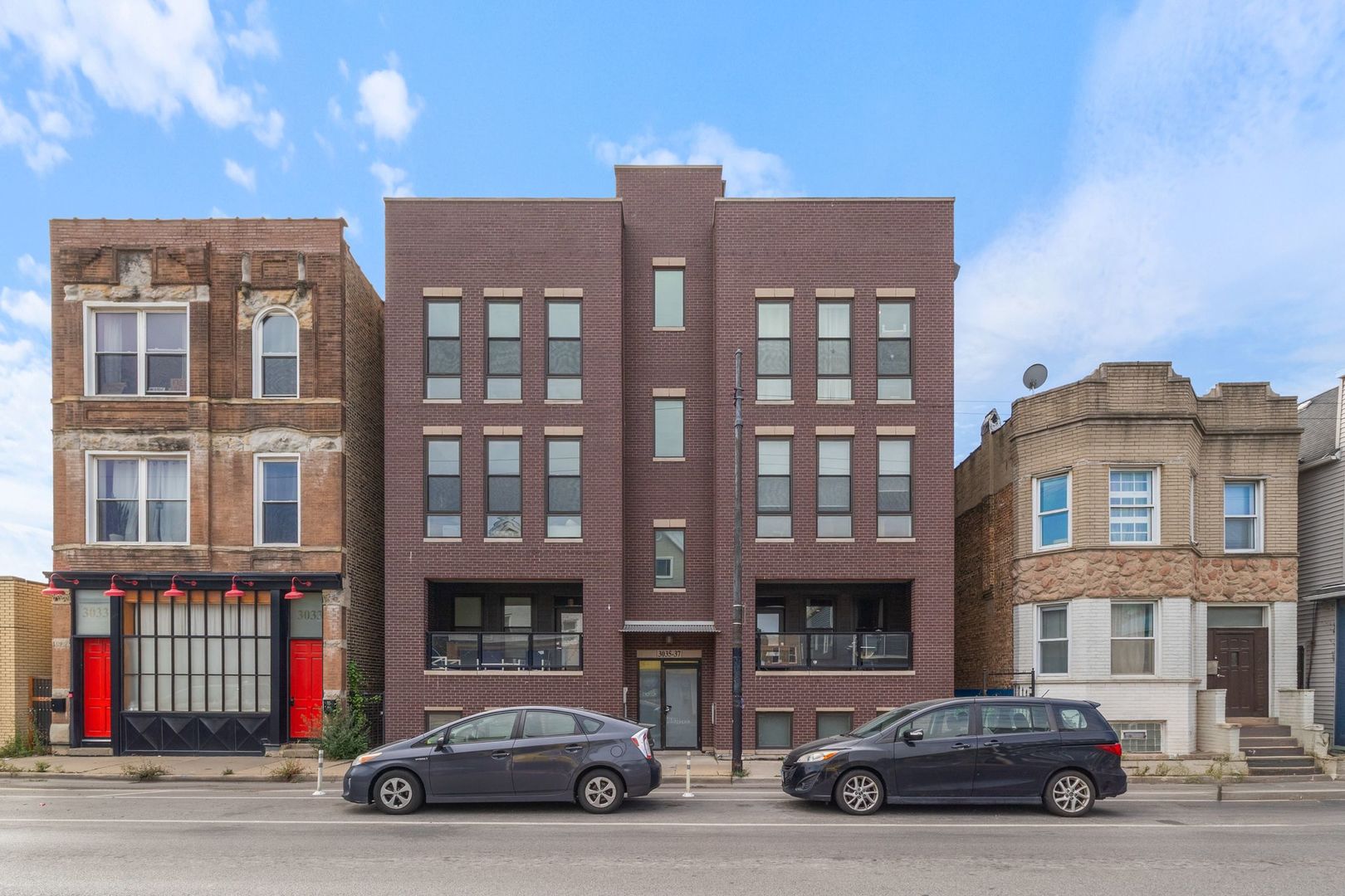 This fresh top-floor 3-bedroom, 2-bath condo is a gorgeous Avondale retreat, crowned by a rooftop deck with postcard-worthy skyline views. Built in 2018, it balances contemporary design with many thoughtful details, creating a space that feels both stylish and livable. Step inside to soaring 10' ceilings and massive windows that drench every corner in light. Hardwood floors run throughout, guiding you to a sleek chef's kitchen with granite countertops, high-end appliances, and an island perfect for cooking and entertaining. The living area is anchored by a glass gas fireplace and is equally suited to cozy evenings or dinner with friends. Down the hall, two guest bedrooms share a full bath, while the secluded primary suite offers three custom closets-including a walk-in-and a spa-inspired bath with heated floors, a double vanity, and a luxurious walk-in shower. Outdoor living shines here: sip coffee on your private balcony, then head upstairs to your oversized rooftop deck, where city views stretch endlessly and will make your friends jealous. Other highlights include built-in speakers, full-size side-by-side laundry, custom window treatments, premium garage parking with additional private basement storage, and smart home touches like a Nest thermostat. With Logandale's dining scene, the CTA Blue Line, 312 River Run, and expressway access all nearby (you do not hear the highway from this condo!), this light-filled home delivers both comfort and convenience in one of Chicago's most exciting neighborhoods.