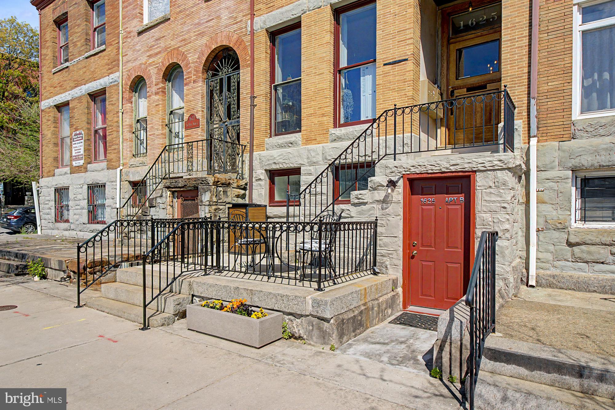 Walls of closets, and newly updated bathroom, with led back lit vanity, on the ground level apartment located  in a spectacular historic renovation of an iconic Baltimore home directly across the street from Penn Station. Small patio with table out front.  Very close to University of Baltimore Law School, not far to Hopkins, and Mica. Almost directly across the street from Penn Station. The apartment is perfect for commuters. Also has a private storage room for bikes and more.  Features secure package delivery, high end appliances, w/d in unit, sprinkler system, central A/C, water included in rent.  Great location to get around Station North, Mt Vernon and the City. Located near The Charles Theatre, Coffee shops, trains, Club Charles, Mercy Hospital , Johns Hopkins Hospital , Penn Station, UMB Law , JHU , MICA , Marc train, Artscape, I83 and more. There is ample street parking and several lots nearby to rent a space for $150/month.  Available furnished or unfurnished