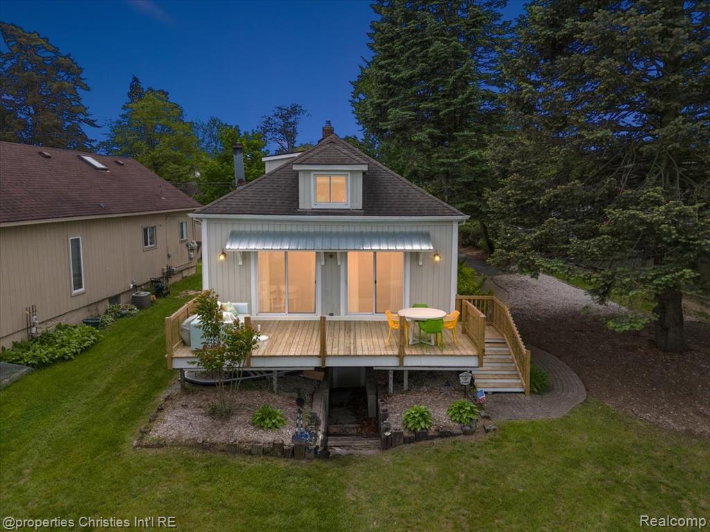 ****OPEN HOUSE SAT 7/5 from 3pm-5pm**** Welcome to your dream lakefront home on the highly sought-after Wolverine Lake—where every detail has been thoughtfully upgraded for luxury, comfort, and effortless living. Inside, both bathrooms were completely gutted and redesigned, with the upstairs bath featuring a raised roof to create a more open and spacious feel. The kitchen has been fully updated with beautiful new appliances and a custom pantry, making it as functional as it is stylish. A new heating and cooling system keeps the home perfectly comfortable year-round, while a full-house generator offers peace of mind in any season. Step outside to a brand-new deck designed with an integrated rainwater flow system beneath, so you can enjoy lake life worry-free. The walk-out basement is an ideal spot for before-and-after lake activities, whether you're coming in from a summer swim or heading out for winter ice skating. It’s been enhanced with durable epoxy-coated floors, a new weather-sealed door, and updated trim for better protection. The garage has a fully replaced roof with added storage space—perfect for stashing all your lake toys and gear. Additional thoughtful touches include a new railing between the main and upper levels and refreshed landscaping with stump removal and fresh mulch. The home is also equipped with a new Culligan whole-house water filtration and softening system, ensuring clean, pure, and softened water throughout. And in the kitchen, a sleek instant hot and cold water spout adds one final touch of everyday luxury. This isn’t just a house—it’s a turn-key lakeside sanctuary where dreams become your daily reality. All furniture, pontoon, and jet ski are new (~12hrs) and negotiable with the sale.