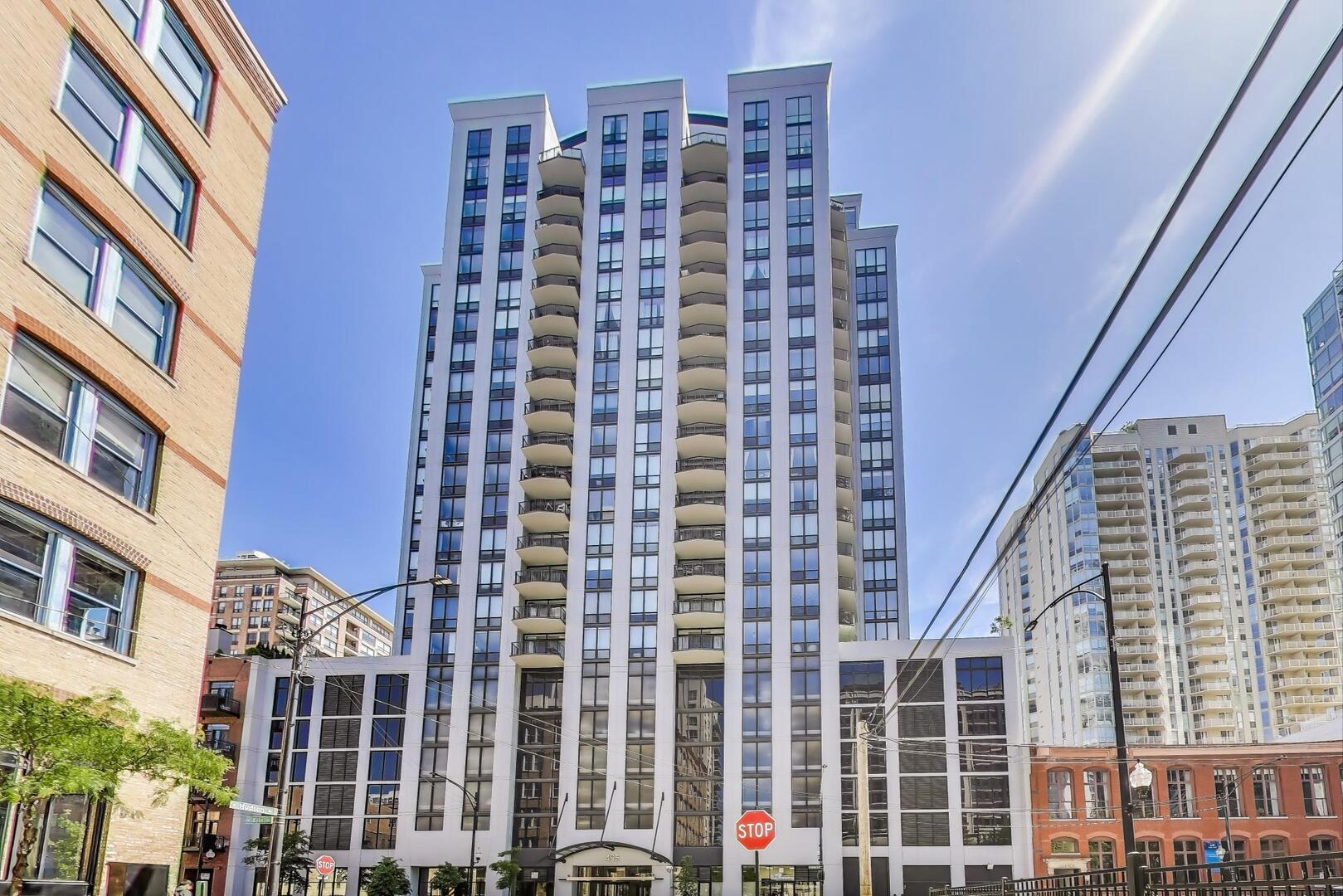Experience the elegance of this magnificent northwest corner unit, which boasts 3  bedrooms and  3 full bathrooms. Nestled in the vibrant River North neighborhood, this residence offers abundant natural light and breathtaking views, creating a welcoming sanctuary in one of the city's most coveted areas.Step inside to discover an open-concept floor plan that exudes sophistication, featuring  kitchen outfitted with stainless steel appliances, a stylish breakfast bar, and a custom backsplash. Elegant hardwood floors grace the living room, kitchen, and hallways, while a cozy fireplace adds to the allure.The unit features floor-to-ceiling windows and expansive balcony that showcase breathtaking city. 2 private suites and 3rd bedroom, currently designed as an impressive closet, can effortlessly revert to its original function.  One heated garage parking space #535 priced at $35,000. This premium oversized corner parking space comfortably accommodates larger SUVs and features high ceilings with additional side space for a scooter or motorcycle.  Enjoy the full range of amenities offered by this building, from two rooftop decks and a well-equipped workout room to 24-hour door staff and a vibrant party room, all designed to elevate your lifestyle.This  pet-friendly and investor-friendly environment encourages exploration and engagement with the best that River North has to offer.  This exceptional location combines tranquility with the vibrant energy of Chicago, delivering the ultimate urban experience. Moments from the East Bank Club, top-tier dining options, parks and an array of nightlife, this residence is surrounded by everything you need.  With the Chicago River and River Taxi just moments away, your access to the city is unparalleled, and the 90/94 and 290 expressways ensure effortless transportation. The Brown Line of the EL train is within easy reach, complemented by a short distance to the renowned shopping on Michigan Avenue and the scenic lakefront.
