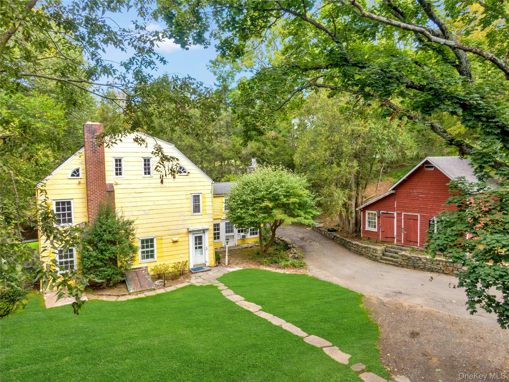 Early AO Continue to show.    This is an "AS IS" sale- 
One of the oldest homes in North Castle, this 4-bedroom, 3,032 sq. ft. antique offers a rare chance to restore or rebuild a classic piece of American architecture. Built in 1778 as a wedding gift for Samuel and Charity Banks, the home predates the town’s earliest records. The Guion family acquired the property in 1804 and added the mid-19th-century ell. Their descendants sold it in 1917, after which it served as a French hospital and convent following World War I. In the mid-20th century, the Henker family lived here while establishing their well-known farm and homestead.

Set on four elevated acres, the house occupies the highest point of the property, offering open views across the rolling land. A long driveway passes two charming outbuildings and a historic stone wall once used to tie horses.

This is a unique opportunity to create your own bespoke home while preserving a true 18th-century treasure in the highly sought-Armonk. Bring your architect and vision—properties of this significance are rarely available.