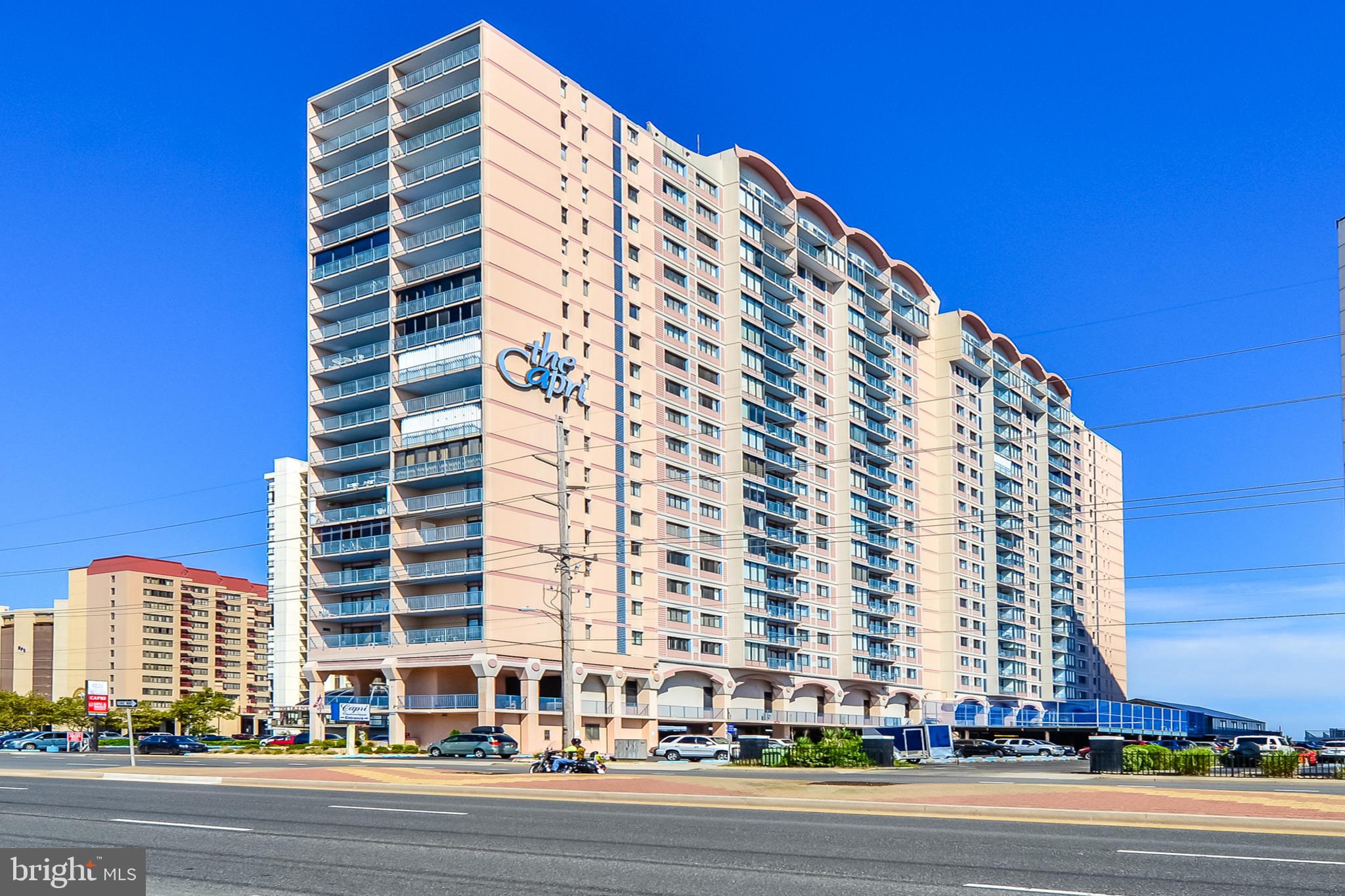 Wake up to the sound of the waves and endless panoramic ocean views! This beautifully maintained, direct oceanfront 3-bedroom, 2-full-bath condo at the Capri is the perfect place to slow down, kick back, and enjoy everything the Ocean City beach lifestyle has to offer. Sold fully furnished, this spacious oceanfront retreat is move-in ready and has been thoughtfully updated. The carpet was replaced just three years ago, the washer and dryer were replaced in 2025, and the HVAC was replaced in 2020. The tile Flooring has been replaced, including a beautiful ceramic-tiled dining room. Both bathrooms have been beautifully renovated with granite finishes, and the primary bathroom features a gorgeous tiled walk-in shower and double bowl sink. The spacious primary bedroom also offers a walk-in closet, while ceiling fans in every room add to the comfortable, breezy beach-house feel. Step inside and take in those panoramic ocean views—the kind of views that make you want to linger over morning coffee, spend lazy afternoons on the beach, and wind down each evening listening to the surf. With three bedrooms and two full baths, there is plenty of room for family and friends to enjoy their own little slice of the coast. The Capri offers an outstanding lineup of amenities, including a heated indoor pool, tennis courts, sundeck, outdoor showers, game room, library, secure lobby, basketball court, game room, exercise room, pool table and ping pong. And when it's time to hit the beach, you're already there, with a wonderful beach area right outside your door. An assigned parking space (#84) plus extra assigned storage adds even more convenience, while the secure lobby provides peace of mind. Whether you're looking for a year-round home, a relaxing beach getaway, or an investment property with potential rental income of approximately $50,000–$60,000 per year, this direct oceanfront condo offers an incredible opportunity to enjoy the laid-back Ocean City lifestyle. Bring your flip-flops, your beach chairs, and your love of the ocean—this is coastal living at its best!