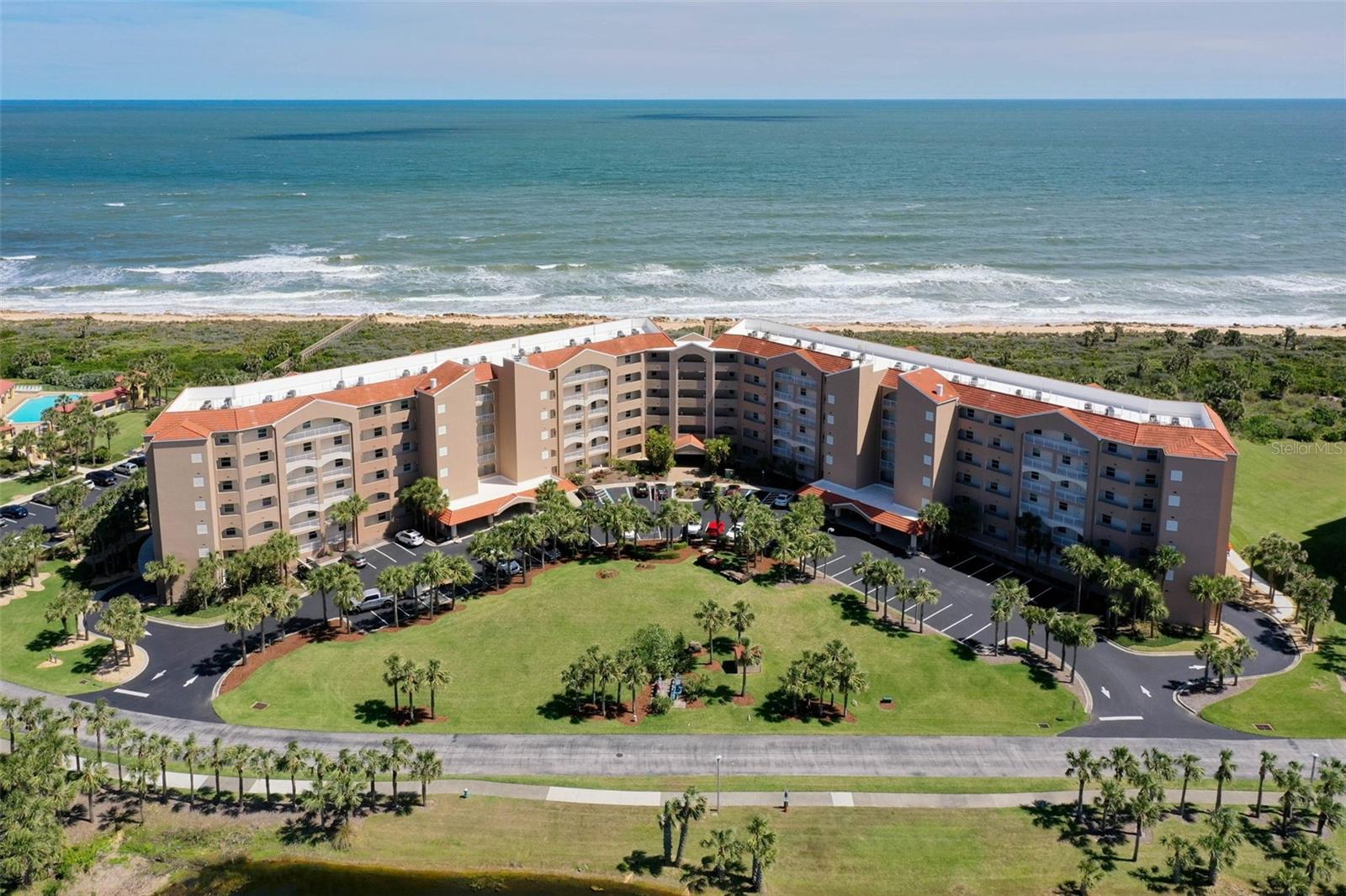 Enjoy coastal living in this beautifully maintained 2-bedroom, 2-bath condo located in the desirable Surf Club community! This first-floor unit offers easy access and a spacious open-concept layout with plenty of natural light. The kitchen features ample cabinet space and a breakfast bar overlooking the living and dining areas—perfect for everyday living or entertaining.Step outside to your private patio and take in the peaceful surroundings just moments from the beach. The primary suite includes a walk-in closet and en-suite bath, while the second bedroom is ideal for guests, a home office, or additional living space.Residents of Surf Club enjoy a variety of amenities including private beach access, community pool, fitness center, tennis courts, and walking paths. Conveniently located between St. Augustine and Daytona Beach, with easy access to shopping, dining, and major roadways.Available for long-term rental. Don’t miss this opportunity to live the beachside lifestyle!