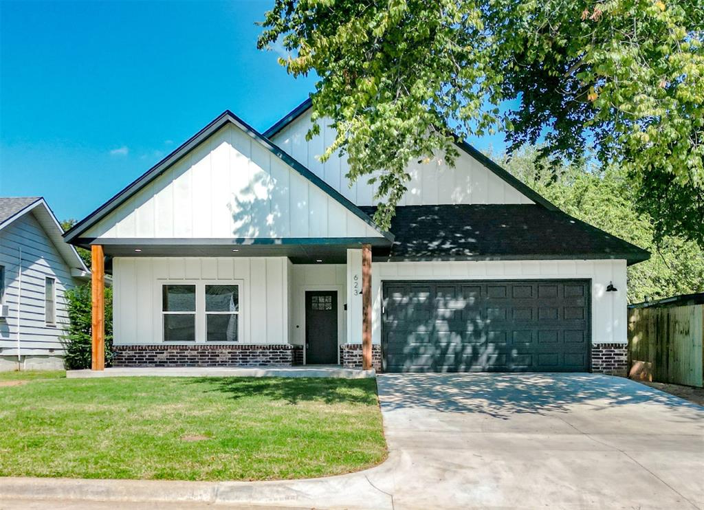 $5,000 Builder Incentive! Welcome to this beautifully crafted brand-new construction home in the heart of Southwest Oklahoma City. Featuring 3 spacious bedrooms, 2 full bathrooms, and a thoughtfully designed open-concept layout, this home offers luxury and functionality for modern living. Step onto the covered front porch and into a bright, open space with durable, stylish wood-look tile flooring throughout the main areas. Off the garage entry, a built-in mud bench adds daily convenience. The heart of the home is the open living, dining, and kitchen area—perfect for entertaining. The kitchen features a large granite island with bar seating, subway tile backsplash, custom vent hood, and a walk-in pantry. The living room boasts vaulted ceilings, a stunning chandelier, and an electric stone pebble fireplace with a decorative tile surround. The guest Jack-and-Jill bathroom showcases striking Calcutta tile work and connects two well-sized secondary bedrooms. The private primary suite offers a large walk-in closet and a spa-like bathroom with a garden tub, separate shower, and dual vanities with designer tile finishes. Step outside to a spacious covered back patio overlooking a large backyard—ideal for relaxing, entertaining, or adding a garden. Located in a well-established area of SW OKC with quick access to shopping, dining, major highways, and Scissortail Park. This home blends custom finishes, quality construction, and great location. Builder's is offering $5,000 toward interest rate buy-downs (potentially as low as 5%) or closing costs thru builder's preferred lender. Don’t miss this opportunity—call us to schedule your private tour today! Buyer to verify schools.