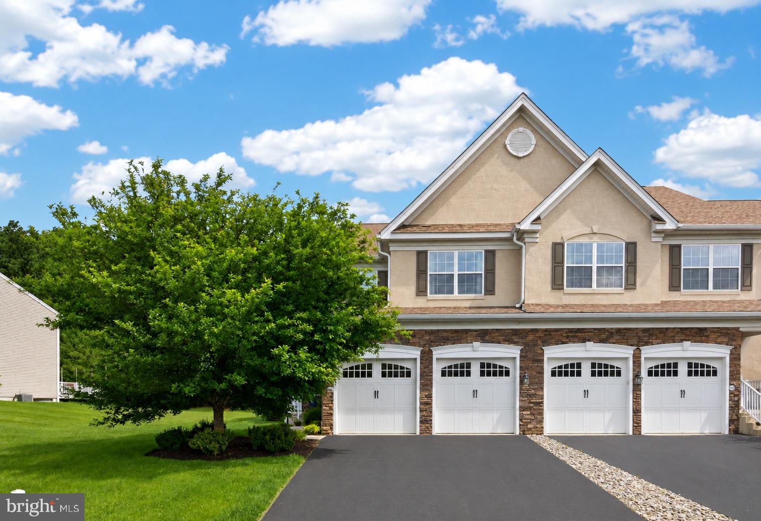 Where else are you getting 2,566 sq. ft., an end unit, 2-car garage, low-$7K taxes and Downingtown schools for $600K?Come experience why people LOVE Byers Station.  Welcome to this beautifully maintained 3-bedroom, 2.5-bath end-unit townhome located in the highly sought-after Courts at Byers Station community and award-winning Downingtown School District. A charming covered front porch and welcoming entryway set the tone for this spacious home filled with natural light. The main level features a dramatic two-story family room with a cozy gas fireplace, soaring windows, and hardwood flooring that flows seamlessly into the eat-in kitchen. Home chefs will appreciate the abundant granite countertop space, peninsula seating, gas cooking, pantry storage, and table space overlooking the rear patio through sliding glass doors. The first floor also offers a formal living room, dedicated dining room, convenient powder room, and direct access to the attached two-car garage.Upstairs, the spacious primary suite serves as a private retreat with a striking tray ceiling, two walk-in closets, and an en-suite bath featuring a soaking tub, stall shower, and linen closet. Two additional bedrooms offer ample closet space and share a full hallway bath. A renovated laundry room adds everyday convenience on the second level. Additional highlights include a new HVAC system installed in 2025, hot water heater replaced in 2022, and an unfinished basement providing abundant storage and endless possibilities for future living space. Enjoy peaceful outdoor living on the serene rear patio overlooking mature trees.Residents of Courts at Byers Station enjoy exceptional community amenities, including two swimming pools, two fitness centers, a clubhouse, tennis courts, basketball courts, and scenic walking trails. The HOA handles lawn maintenance and snow removal, allowing for a low-maintenance lifestyle. Ideally situated near Marsh Creek State Park, as well as the shopping, dining, and entertainment destinations of Downingtown and Exton, this home offers the perfect blend of comfort, convenience, and community. This home has been pre-inspected for extra peace of mind. Attend an Open House or schedule a private tour today!