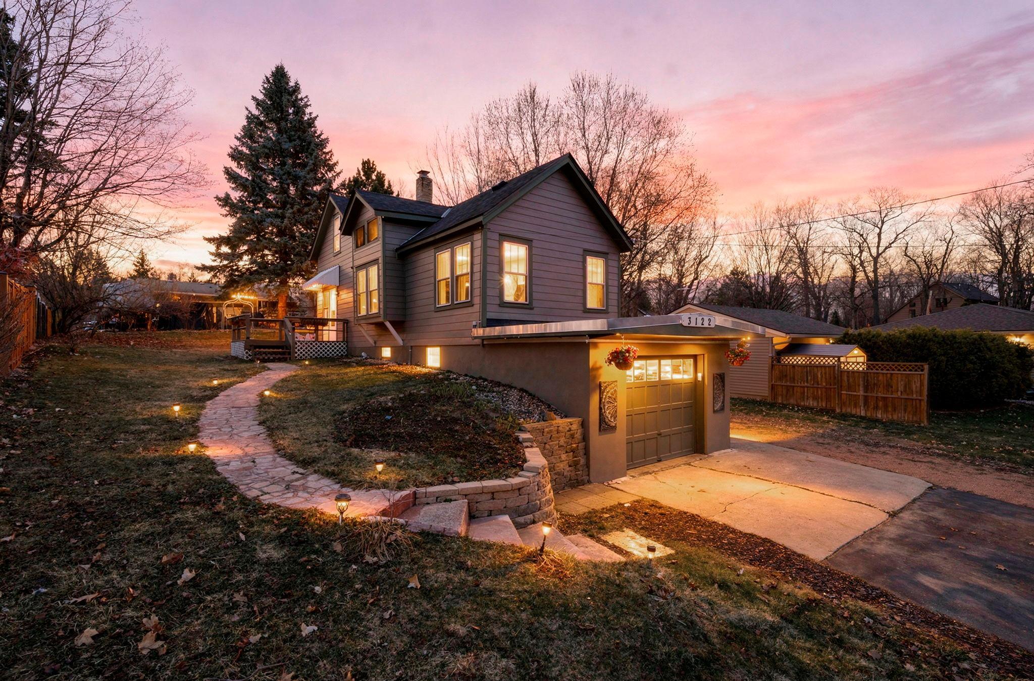 Prime Phelps Island location in the heart of Mound, set within a mature, tree-lined neighborhood just moments from Lake Minnetonka, nearby parks, and local dining. This charming 3-bedroom, 1-bathroom home perfectly blends everyday convenience with relaxed lakeside living.Inside, enjoy a light-filled interior with sleek, modern updates throughout. The kitchen features crisp white cabinetry, stylish tile flooring, and a bright, connected dining space with a statement light fixture. Fresh paint, updated lighting, and new cabinet hardware (March 2026) enhance the home’s clean, contemporary feel.The inviting living room offers a cohesive flow with continuous tile flooring, abundant natural light, and peaceful, tree-lined views. A built-in window seat adds charm and functionality, ideal for a cozy reading nook. The main-level bedroom includes plush carpeting, ample closet space, and multiple windows, while the nearby full bathroom features tile flooring, a tiled tub/shower surround, and convenient storage.Upstairs, a spacious and versatile upper level creates the perfect retreat with soft carpeting, closet space, and a newly installed baseboard heater with built-in thermostat (2026).The lower level adds an additional bedroom, laundry area with utility sink, and walk-out access to the attached garage for easy year-round convenience.Enjoy exceptional outdoor living with mature trees, a welcoming front walkway, and multiple outdoor spaces, including a patio with fire pit and a spacious side deck, perfect for relaxing or entertaining.Additional updates include new carpet throughout (2024), new roof, decking, and siding (2025), and a new high-efficiency water heater and piping (2025).