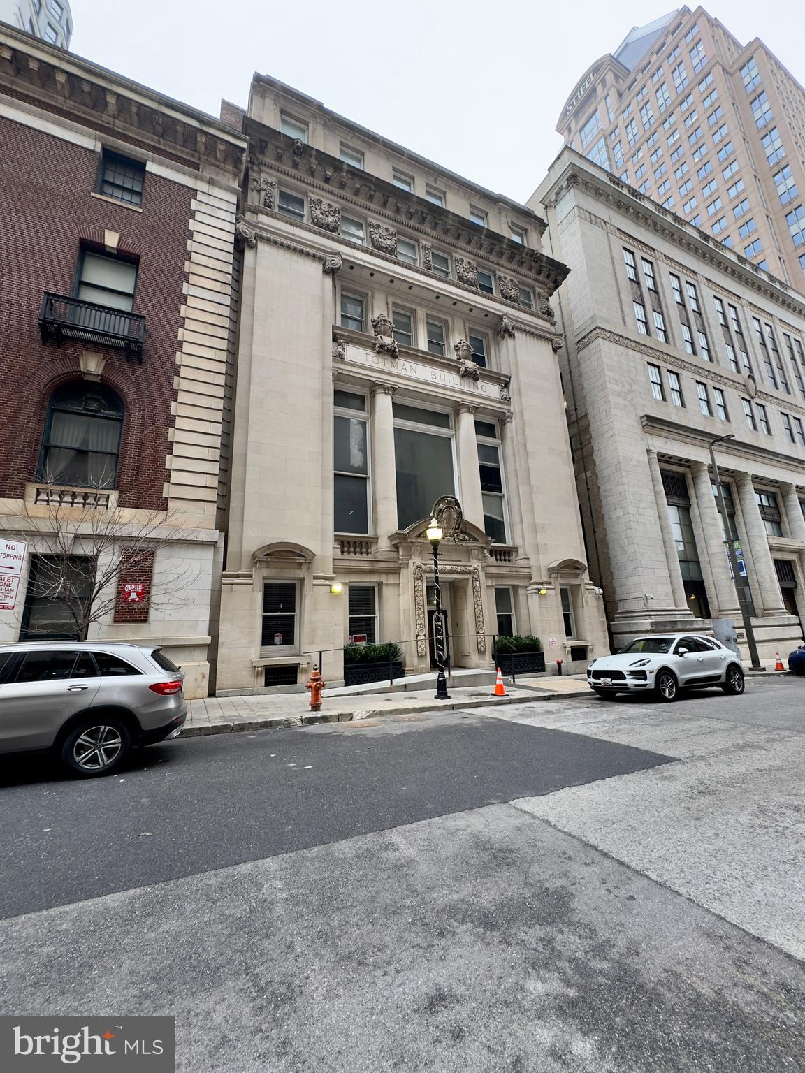 Positioned in the heart of downtown Baltimore, 210 E Redwood St – Unit 6D offers a refined urban living experience inside the historic Totman Building, known for its striking architectural presence and timeless character. This apartment blends classic charm with modern convenience, creating a space that feels open, welcoming, and perfectly suited for city living.From the moment you enter, the apartment immediately impresses with high ceilings and expansive windows that invite abundant natural light throughout the home. Being a corner unit, the residence benefits from multiple exposures, allowing sunlight to flow across the living spaces and enhancing the sense of openness. The thoughtfully designed layout makes excellent use of every square foot, creating an environment that is both comfortable and functional.The living area features wood flooring and neutral tones, creating a versatile backdrop that complements any style of décor. Natural light pours in through the windows, giving the space an airy atmosphere that makes it ideal for relaxing evenings or entertaining guests.The kitchen is designed to meet the needs of everyday living while maintaining a polished look. It features granite countertops, stainless steel appliances, and wood flooring, along with a full suite of appliances including a refrigerator, stove/oven, microwave, and dishwasher. A breakfast bar adds a convenient spot for casual meals, morning coffee, or conversation while cooking.The bedroom continues the home’s cohesive design with wood flooring, neutral finishes, and generous natural daylight. A closet provides ample storage while a ceiling fan enhances comfort throughout the seasons, making the room both relaxing and practical.The bathroom offers a clean and well-appointed layout featuring tiled flooring, a bathtub, lavatory, cabinet storage, and a vanity mirror. It provides the essentials for daily routines while maintaining a neat and functional design.For added convenience, the unit includes in-unit laundry with a washer and dryer, allowing residents to enjoy the ease of handling laundry from the comfort of home.Living at 210 E Redwood St – Unit 6D means enjoying the energy and convenience of downtown Baltimore while residing in a building rich with architectural character. Restaurants, shops, cultural destinations, and major city attractions are all within easy reach, making this location ideal for those who want to experience the best of city life.Nearby Landmarks and Attractions• Inner Harbor• National Aquarium• CFG Bank Arena• Baltimore Convention Center• Power Plant Live!• Harbor East dining and shopping district• University of Maryland Medical Center• Camden Yards• Federal Hill ParkIf you are looking for a centrally located residence that combines historic character with modern living comforts, Unit 6D at 210 E Redwood St stands out as an exceptional opportunity in the heart of Baltimore.Monthly Water Fee: $35.00 per occupantPets are allowed with a pet addendum, a $500 non-refundable pet fee, and a $25 monthly pet rent per pet.RENTAL LICENSE No.: L145730Agency disclosed upon initial contact. Agent conducts showings; BMG manages follow-up, paperwork, move-in post-approval. Vouchers work with BMG directly.