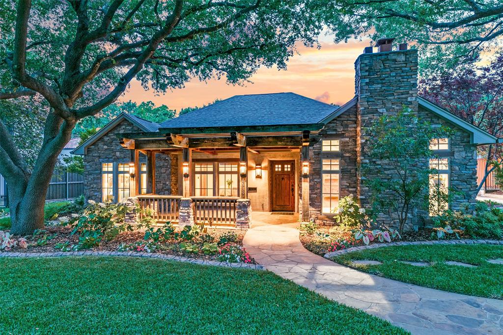 Exceptional Single-Story Estate on Nearly Half an Acre in One of Dallas’ Most Beautiful Neighborhoods.  Welcome to this rare and remarkable single-story property nestled on almost ½ an acre, featuring a fully HVAC-conditioned guest house and unmatched curb appeal in a serene, tree-lined setting. From the moment you arrive, the manicured grounds, mature trees, and inviting front porch create a warm and private atmosphere.  Step inside to discover an ideal layout: an office and guest bedrooms to the left, and to the right, a spacious dining area, gourmet kitchen, and cozy family den with fireplace. Straight ahead, the second living area opens through sliding glass doors to your backyard oasis—complete with a large pool, luxurious outdoor kitchen, fireplace, and the fully equipped guest house.  Inside the main home, exposed wood beams, rich hardwood floors, and abundant natural light elevate the living spaces. The chef’s kitchen boasts high-end appliances, a butcher-block island, built-in wine fridge, and a charming breakfast area—perfect for entertaining or everyday living.  The main residence offers 3 bedrooms, 2 bathrooms, and an attached 2-car garage. The expansive guest house adds a 1-bedroom, 1-bath layout with a full kitchen, living room, its own laundry area, and private entrance—bringing the total to nearly 3,000 square feet of HVAC-controlled living space.   A third standalone building—currently used as a greenhouse and storage—offers endless potential as a home gym, studio, office, or creative retreat.  Lovingly restored and meticulously maintained, this special home is a true reflection of pride in ownership. Full list of upgrades available in the MLS documents.  Contact your local realtor or listing agent Lee Lamont for more info or a private showing.