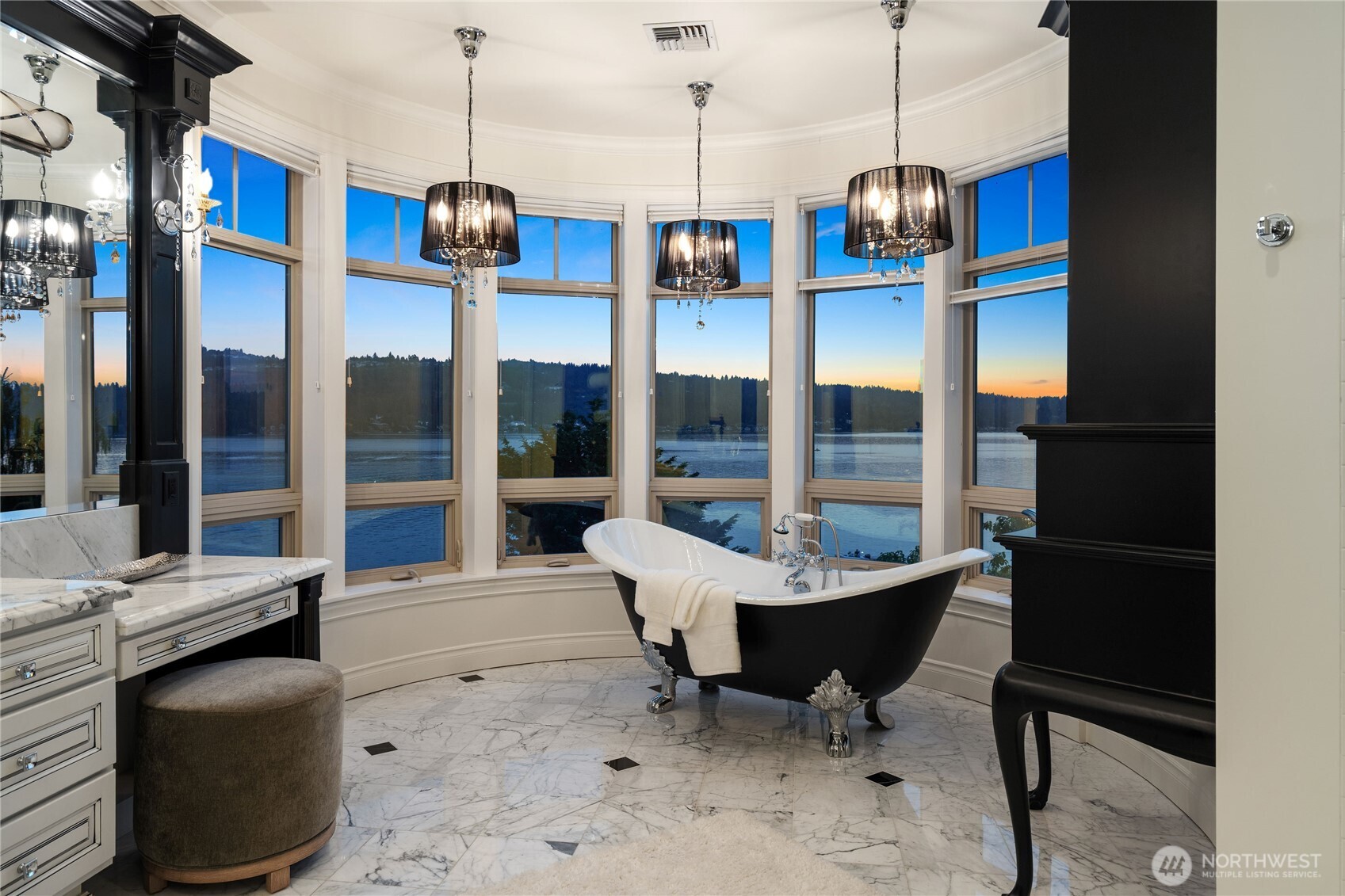 Luxury primary bath with spa finishes and elegant design in this Lake Sammamish waterfront estate.