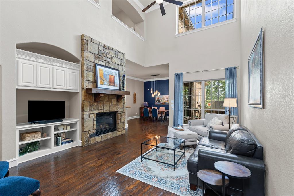 Tucked behind the gates of Heritage Oaks, one of Colleyville’s most cherished communities, 3712 Bur Oak invites you into a life of ease, beauty, and quiet luxury. Imagine morning strolls along peaceful walking trails, afternoons by the shimmering community pond and evenings unwinding on your private patio surrounded by serenity. Inside, the home opens with soaring ceilings, rich hardwood floors and a stunning floor-to-ceiling stone fireplace, an elegant heart of the space where memories are made. Sunlight pours into the bright, timeless kitchen, where white cabinetry, granite countertops, stainless steel appliances, a gas cooktop and an oversized island create the perfect setting for everything from casual breakfasts to festive gatherings. The primary suite feels like your own private escape, complete with a spa-inspired bath featuring a Jacuzzi tub, seamless glass shower and generous storage for effortless living. Upstairs, discover the rare gift of two additional living areas: a spacious game room and a dedicated media room, offering endless possibilities for movie nights, work-from-home comfort, or hosting guests with style. Plantation shutters throughout add classic charm, while the low-maintenance lifestyle allows you to spend more time enjoying what matters most. With HOA coverage that includes exterior care, roof insurance, and landscaping, this is truly lock-and-leave living at its finest. Perfectly positioned near Colleyville’s premier dining, shopping and top-rated GCISD schools, this home is more than a place to live, it’s a place to belong.