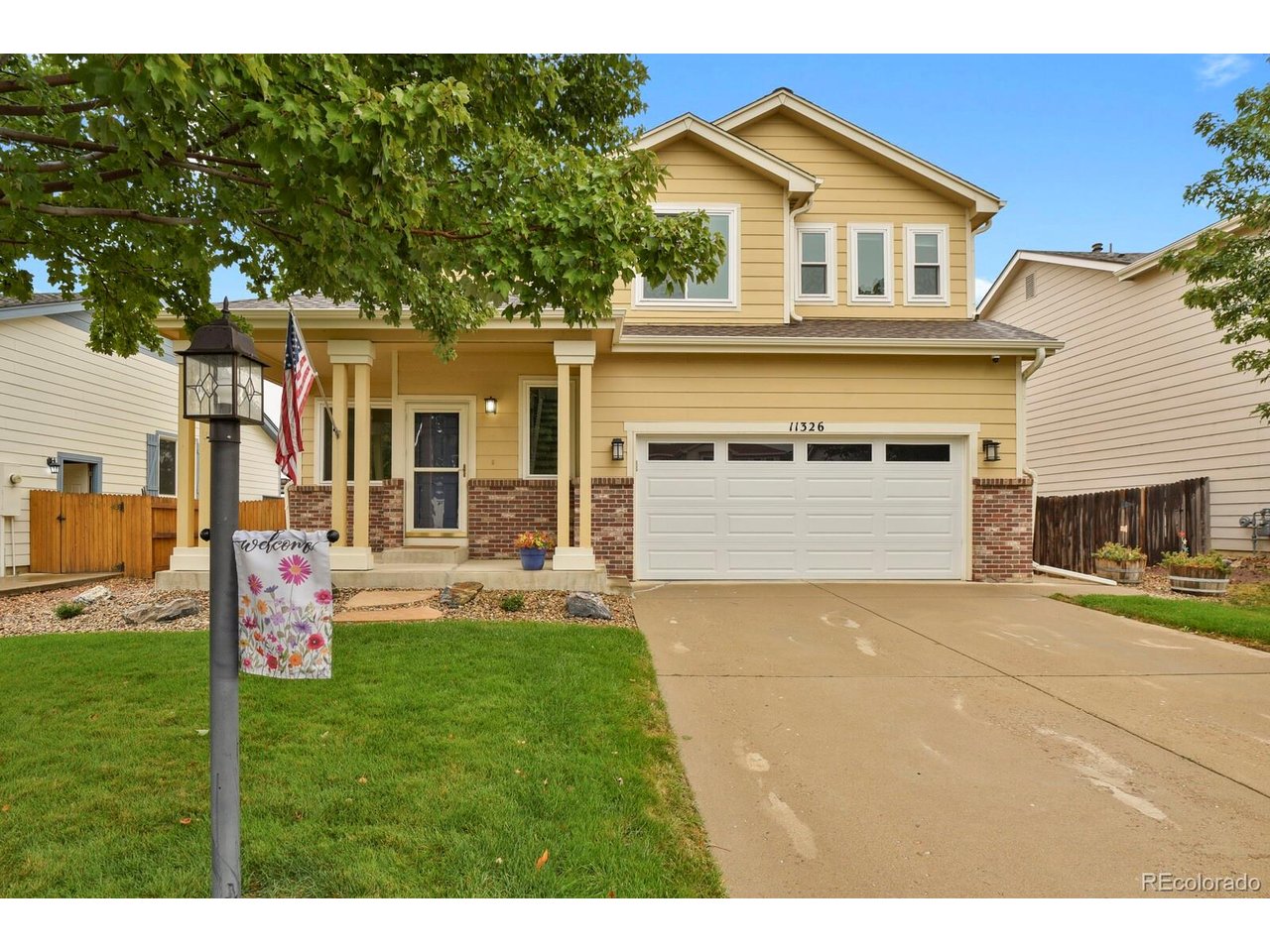 Move-in ready and one of the best values in Oak Meadows! Better than new - Beautiful two-story home with a stunning yard, reflecting pride of ownership. The bright, open layout features high ceilings and abundant natural light. The spacious kitchen offers quartz countertops, a stylish backsplash, 42-inch cabinetry, a pantry, stainless steel appliances, and an eat-in area that flows into the family room and a private, fenced, park-like backyard. Ideal for entertaining or relaxing, the backyard faces open space, providing breathtaking sunrises, cool shaded evenings, a large patio, gorgeous landscaping with raised garden beds, and a storage shed. Upstairs, you'll find three generously sized bedrooms, a roomy loft, and two bathrooms, including a primary suite with dual sinks, a soaking tub, and a walk-in closet. The full-size unfinished basement, with rough-in plumbing and framing, is ready for future growth.  Recent upgrades like new windows, roof, a brand-new furnace, and central air add peace of mind. Enjoy a short stroll through the friendly neighborhood to the 5.3-mile Firestone Trail for walking, jogging, or biking, with easy access to I-25, Longmont, Boulder, Denver International Airport, and Denver.
