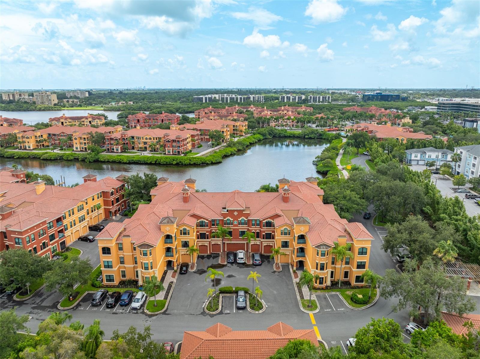 Resort living in Clearwater! Luxury living at the Grand Bellagio as soon as you enter the 24 hour live guard gate you're greeted with a beautiful Italian fountain..The clubhouse boasts beautiful marble and Italian style decor.. An impressive array of amenities, including a resort-style pool and spa, with cabanas. Outdoor kitchen. Movie room, fitness center, community docks, tennis courts, sand volleyball, playground, sauna, walking trails, car wash, business center, billiards.. The community is also pet friendly and welcomes residents of all ages. Located in building 6.. The unit is newly renovated , new paint, laminate floors, and baseboards.. Both bathrooms have new tile and the walk in shower has a new custom glass door.. The unit is a spacious 2-bedroom, 2-bathroom condominium offering an inviting open floor plan designed for both everyday living and entertaining. The kitchen features granite countertops, maple cabinetry with crown molding, stainless-steel appliances, a gas range, and a generous breakfast bar that opens to the dining and family room areas. The spacious layout creates an easy flow throughout the home and plenty of room to entertain family and friends. This unit comes with an extra storage unit on the 1st floor..This luxury community also has gazebos, grills and benches out back for watching dolphins and manatees.. Conveniently located just off US-19 and Belleair Road, Grand Bellagio offers easy access to Tampa, St. Petersburg, Clearwater Beach, and two international airports-all within approximately 25 minutes. Costco, Target, Sams Club are minutes away.