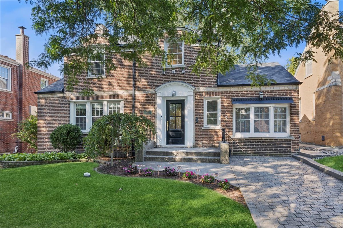 This beautifully cared-for Georgian offers a perfect blend of timeless character and modern updates. The light-filled kitchen features quartz counters, sleek finishes, and oversized picture windows that frame views of the backyard and side yard-making it the true heart of the home. French white oak flooring adds warmth and style, while the updated bathrooms bring a fresh, modern touch.    The lower level is cozy and inviting with new carpeting, ideal for movie nights, play space, or a home gym. Recent upgrades bring peace of mind, including a new roof, garage siding, gutters, and basement windows-all completed in 2021.    Outside, you'll find a large deck and a professionally landscaped yard with mature trees, offering plenty of room to gather, play, and relax. The new fence provides privacy, while the setting creates a welcoming retreat for everyday living and entertaining.    Every detail has been thoughtfully cared for, making this home as easy to live in as it is easy to love.