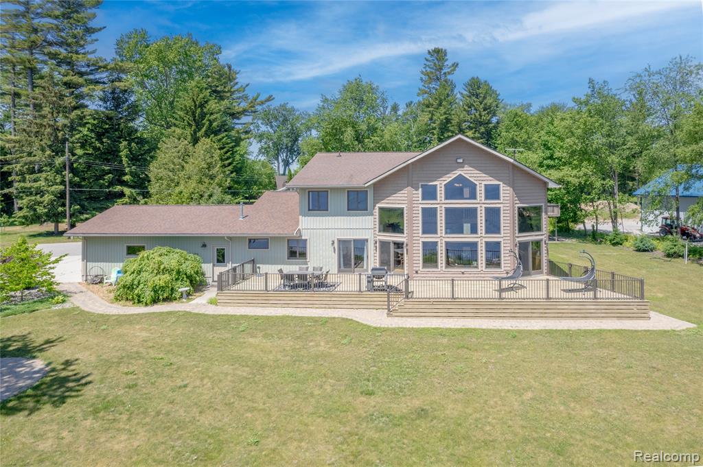 Set along the scenic shores of Lake Huron, this stunning five-bedroom, three-bathroom home is a true waterfront haven. Designed with an open floor plan and anchored by soaring 20-foot windows, every inch of the home was made to showcase exceptional lake views making it a perfect spot to watch  freighters and sailboats glide by.

Step inside to find a spacious layout ideal for both everyday living and entertaining. The main level features warm natural light and sweeping views, while the kitchen opens directly into the living and dining areas, making it easy to stay connected with guests. The primary bedroom suite is generously sized and offers a peaceful retreat at the end of the day.

  Outside, a private guest house provides added space for family, visitors or potential rental income. The lower level of the guest home includes a bar and area for pool table or additional entertainment space. Bonus storage/ workshop space for all lawn equipment. Large hot tub overlooking the beautiful Lake Huron views. Heated 3.5-car garage keeps vehicles and gear ready year-round. With substantial water frontage and nearby Harbor Beach Marina, it’s easy to spend your days on the water and your evenings enjoying the quiet lapping of waves.

Located just minutes from local parks like the Bathing Park in Harbor Beach, this property combines serene living with convenient outdoor amenities. Whether you’re lounging with a book, enjoying sunsets, or finding new excuses to buy “just one more kayak,” this Lake Huron home offers the perfect setting. 

If waking up to lake breezes and ending the day with panoramic views speaks to you—this might just be the address of your dreams.