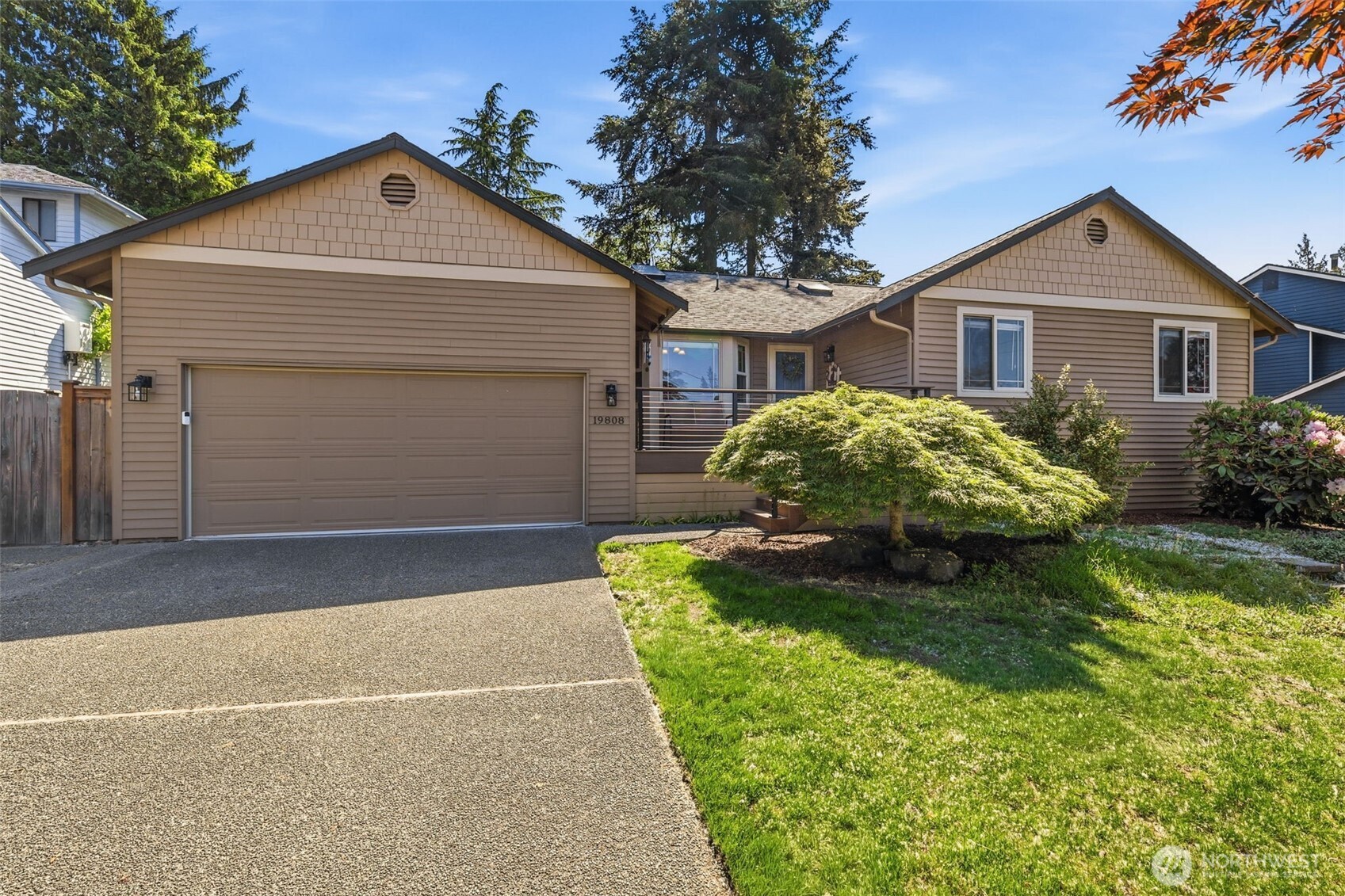 Welcome home to this beautifully updated 3-bedroom, 1.75-bath residence offering comfort, style, and exceptional living spaces throughout. The lovely primary suite features a spacious walk-in closet and an updated private bath. Enjoy new flooring, newer vinyl windows, air conditioning, custom millwork, and abundant built-in cabinetry that add both character and functionality. The inviting gas fireplace creates a warm gathering space, while the enormous sunroom offers endless possibilities for a home office, fitness room, hobby space, or year-round entertaining. Step outside to a beautifully landscaped, fully fenced backyard designed for privacy and relaxation. The large patio and stunning new modern front porch provide ideal outdoor living areas for entertaining or enjoying peaceful mornings. Located in an excellent neighborhood close to schools, parks, walking trails, shopping, dining, and everyday amenities, this home combines convenience with tranquility. A rare opportunity to enjoy privacy, space, and thoughtful updates in a highly desirable location.