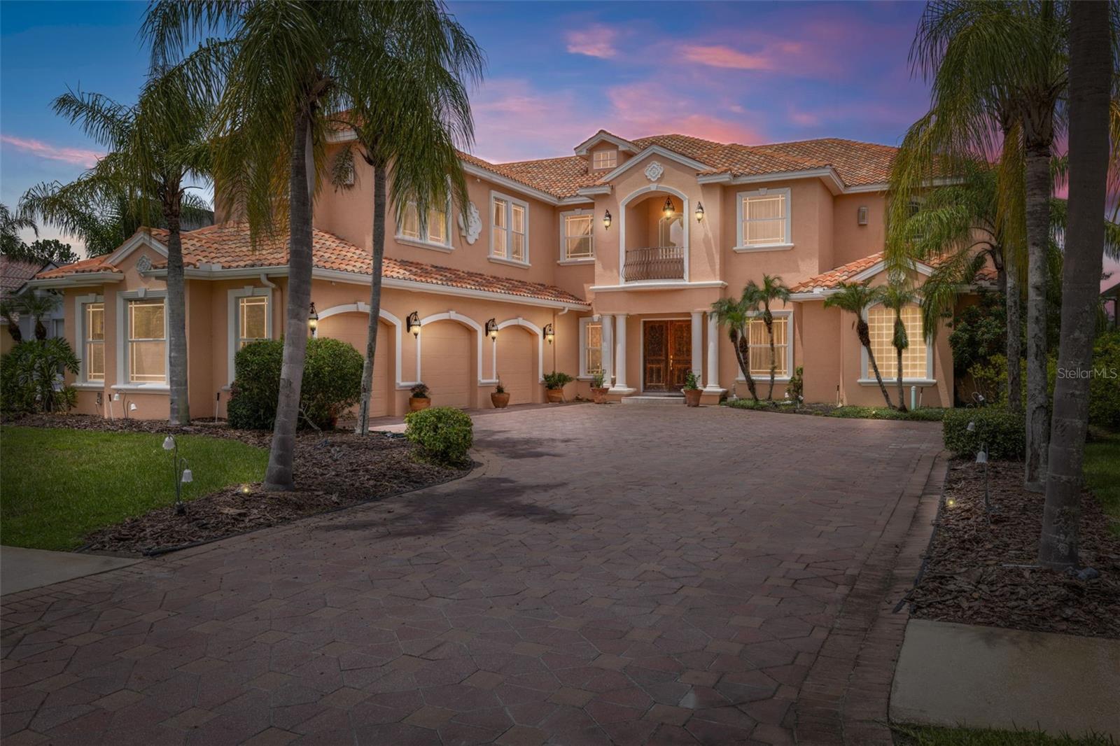 Auction Property. EVERYONE WELCOME TO BID...THIS LIVE AUCTION SALE IS HELD AT THE PROPERTY ON SATURDAY, AUGUST 2nd, 2025, at 11:00 am.  Preview from 10:00 am on sale day. Because this is an auction sale, the home may sell for less or more than the list price.  The seller would consider selling prior to the auction.  If you are interested, please reach out.

DIRECTLY ON THE LAKE W/SEAWALL.....Experience luxury living in this spacious and thoughtfully designed 6-bedroom, 6.5-bath pool home with dual owner’s suites, a 3-car garage, and stunning lake views throughout. From the grand double-door entry to the soaring ceilings and wrought iron accents, every detail impresses.  Enjoy entertaining in the open concept living area with a chef’s kitchen featuring wood cabinetry, granite counters, a gas cooktop island, double ovens, and a large walk-in pantry.  The casual dining nook overlooks the pool through an aquarium window, while the formal spaces and private office present elegance and function.  Both primary suites (up and down) include lake views, spa-like baths, and walk-in closets.  Upstairs features a loft, additional bedrooms (most with en-suite or shared baths), and a media room with wet bar and flex space.  A third-level air-conditioned "imagine room" offers endless possibilities.
Outside, unwind in your private oasis with a pool, outdoor kitchen, and pool bath.  Added bonuses include two laundry rooms, pre-planned elevator space, custom closets, natural gas, and more.  Set within the guard-gated community of Cory Lake Isles with resort-style amenities and a 165-acre boating lake.

BUYER will receive a general warranty deed free and clear of all debts, guaranteed with a title insurance policy at closing....4-Point inspection will be attached shortly.