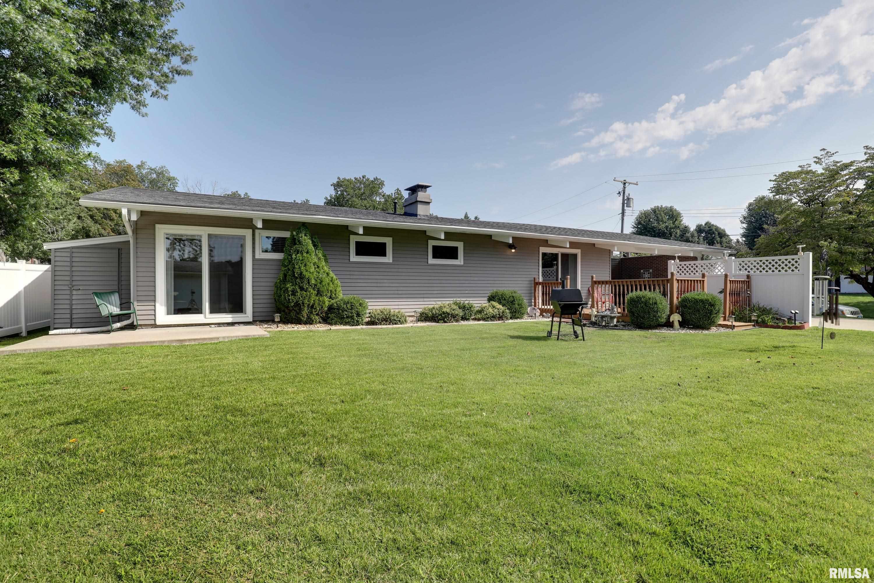 Fall in love with this Mid-Century masterpiece in a great south side subdivision! 728 Ridgewood Dr is a stunning 3 bedroom, 2 bath meticulously maintained ranch home that offers a  modern open floor plan with the charm you'd expect from that era including vaulted wood ceilings and loads of windows and skylights for bright sun drenched rooms. The inviting kitchen with its generous white cabinetry and large island open seemlessly to the warm and inviting living space grounded by the gas fireplace and make the perfect place to gather. The spacious bedrooms all have generous closets and the primary suite is a sanctuary with its full bath complete with double vanity. No need to worry about storage in this single level home; between the convenient main floor laundry with functional peg boards and massive storage closets along with the storage room attached to the west side of the house and an additional 12x16 shed this one has plenty! And you'll love relaxing on your deck in your stunningly landscaped yard bordered by a no maintenance white vinyl fence. There is nothing left to want with this classic MCM home, so schedule your showing today!