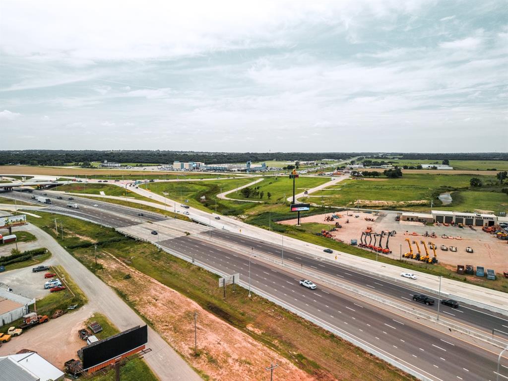 Prime commercial development opportunity offering 10± acres with outstanding Interstate 35 frontage in one of the fastest-growing corridors in the Oklahoma City metro. Located just one-half mile from Riverwind Casino and minutes from Norman, this highly visible property offers exceptional access and exposure with thousands of vehicles traveling I-35 daily. The level topography and strategic location make it ideal for a wide variety of commercial uses, including retail, restaurant, hospitality, office, medical, mixed-use, entertainment, or service-related development. Surrounded by continued residential and commercial growth, this property presents a rare opportunity to secure a premier development site in a high-demand area with outstanding long-term investment potential. Whether you’re an investor, developer, or business owner, this tract offers the visibility, accessibility, and location needed to bring your vision to life.