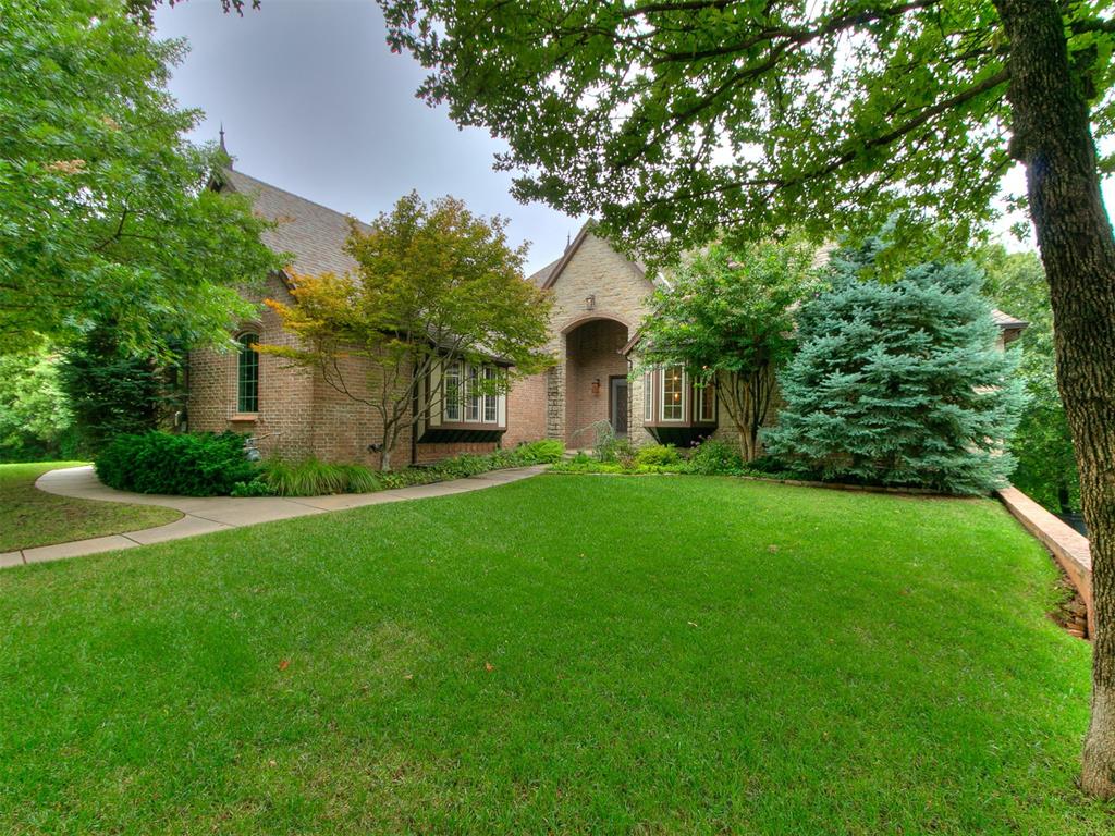 At the end of a quiet cul-de-sac, you’ll find this gem of a home that’s been so well cared for, it feels brand new. The setting is something special, about half an acre of trees, a peaceful creek, and extra common space that makes the whole property feel private and tucked away. One of my favorite things? The outdoor spaces. There are two of them, each with their own fireplace. The main deck has a built-in grill and looks out over the trees, it’s the kind of place where you’ll want to spend every evening. Inside, light pours in through the windows, and the open layout just feels easy and welcoming. The living room has a cast stone fireplace, and the kitchen is a dream: big stone-wrapped bar, Thermador gas range, built-in KitchenAid refrigerator and freezer, granite counters, farmhouse sink, and walk-in pantry. It connects right out to the deck so cooking, grilling, and entertaining all flow together. The primary suite is a retreat all on its own, with bay windows looking out at the trees. The en-suite bath feels like a spa with soaking tub, walk-in shower, dual vanities, and a closet with custom built-ins. The 4th bedroom has a full guest bath with walk-in shower nearby and its own access to the deck. It can also be used as an office, complete with custom paneling and perfect for working from home. Downstairs, the walkout basement is all about fun and function: a big bonus/game room with serving bar and fireplace, a separate media room, and two spacious bedrooms, each with their own full bath. And yes, the details have been thought through: a 3-car garage with epoxy floors, a mudroom/utility space, proper drainage with full guttering, dry creek bed, and thick fescue grass in front and back. This home balances comfort, style, and peaceful outdoor living in a way that’s hard to find. It’s one of those rare spots you’ll never want to leave. **Be sure to check out the virtual tour**