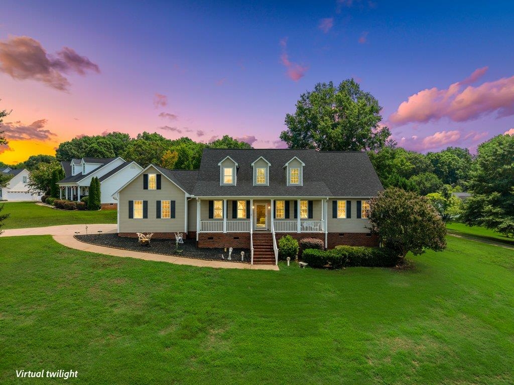 404 Shallowford Drive | Boiling Springs, SC | Offered at $475,000  Welcome home to this beautifully maintained 5-bedroom, 3-bath residence offering 2,545 square feet of comfortable living space on a spacious 0.71-acre lot. This home could easlity be a multi generational home. Built in 2004, this property combines generous living areas with numerous recent updates, giving buyers peace of mind for years to come.  One of the home's standout features is a private bedroom suite upstairs making it an ideal setup for multigenerational living, extended family, guests, or a private retreat. This flexible floor plan offers the space and versatility today's buyers are looking for.  Major improvements include two new HVAC systems (2025), a new basement door (2025), new roof installed in 2020, new hot water heater, new garbage disposal, and new microwave (2020). Enjoy cozy evenings by the gas log fireplace, fueled by a dedicated propane tank.  A standout feature is the 17 kW permanent whole-house generator, providing dependable backup power when you need it most.  Car  enthusiasts, hobbyists, and those needing extra storage will appreciate the attached two-car garage plus a 24' x 20' detached garage/workshop with electricity, offering endless possibilities for projects, storage, or a home workshop.  With low annual HOA dues of just $253, this property offers exceptional value in one of Boiling Springs desirable locations, close to shopping, dining, schools, and everyday conveniences.  Don't miss this opportunity to own a move-in-ready home with major system updates, abundant garage space, and room to spread out. Schedule your private showing today!