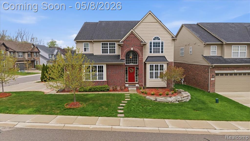 Welcome to this exceptional Colonial residence in the prestigious Stonegate subdivision of Orion Township, where refined design meets everyday comfort. ,this home offers impressive curb appeal and a truly turnkey experience.Inside, thoughtfully designed living spaces are enhanced by rich hardwood flooring, detailed crown molding, and expansive windows that fill the home with natural light. The dramatic two-story great room, anchored by a gas fireplace and soaring window wall, creates a striking yet inviting centerpiece.The heart of the home is a beautifully appointed gourmet kitchen, featuring granite countertops, an oversized island, walk-in pantry, and upgraded stainless steel appliances ,designed for both elevated entertaining and effortless daily living.Retreat to the luxurious primary suite showcasing a tray ceiling, expansive en-suite bath, and generous walk-in closet. Three additional well-proportioned bedrooms complete the upper level, offering comfort and flexibility for family or guests.The finished 3-car garage with epoxy flooring adds both function and polish, while the daylight basement provides a bright, versatile extension of living space ideal for a media room, fitness area, or executive-style home office.Positioned on one of the largest corner lots in the community, the outdoor setting is equally impressive, featuring a custom deck and elegant paver patio perfect for upscale entertaining or peaceful evenings at home.Ideally located near premier shopping, dining, and commuter routes, this home delivers a rare blend of space, sophistication, and lifestyle in one of Orion Township’s most desirable neighborhoods.A truly standout offering. schedule your private showing today.