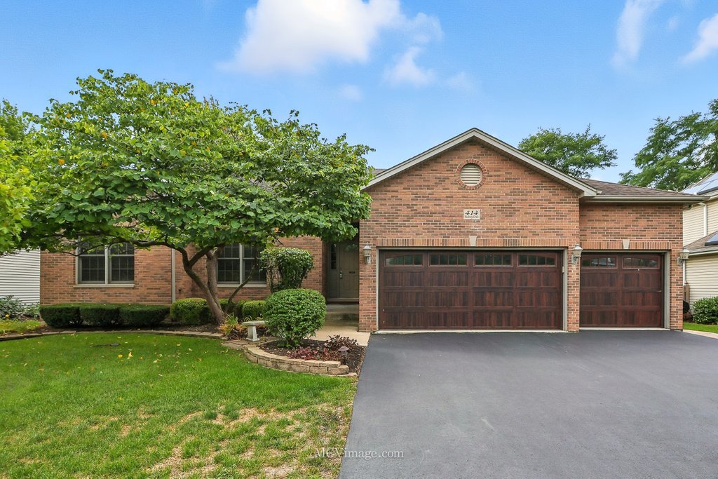 Welcome to Deerpath Creek, where this custom ranch offers not just a home, but a haven - a place where soaring ceilings, warm fireplaces, and sunlit spaces invite you to stay awhile.This custom 4 bedroom ranch with finished basement and 3 car garage is the one you've been waiting for! Just listed and possesses so many fine features~ it's one level living at its finest! Enter the show-stopping great room with cathedral ceiling & floor to ceiling brick fireplace. Gourmet kitchen boasts an abundance of cabinets, granite, island, & is open to the breakfast room with easy access to the amazing backyard oasis. The primary suite is a sanctuary of its own, with TWO closets and a 16x11 spa-inspired bath featuring dual sinks, walk-in shower, and a soaking tub for the moments you need to breathe and unwind. Two additional bedrooms on the main floor and a fourth in the finished basement offer room for all. Fully-finished basement could be a home of its own, featuring kitchenette, second fireplace, and full bath to create endless possibilities for guests or gatherings. An entertainer's dream! Workshop is in place for your hobbies, or easily converted to 5 th bedroom.The outdoors truly enchant. A newly built 26x19 maintenance-free deck and custom 13x12 screened sunroom with electric, and two stamped concrete patios invite you to savor each season in tranquil beauty. Sellers didn't intend to relocate and invested substantially $60,000 in this outdoor space to overlook sunsets and enjoy their own oasis. This is more than a home - it's a retreat for the soul. Don't miss the newer furnace, hardwood floors, soaring and tall ceilings or storage galore. Must see to believe! Priced to sell in a hurry~ Schedule your appointment today!!