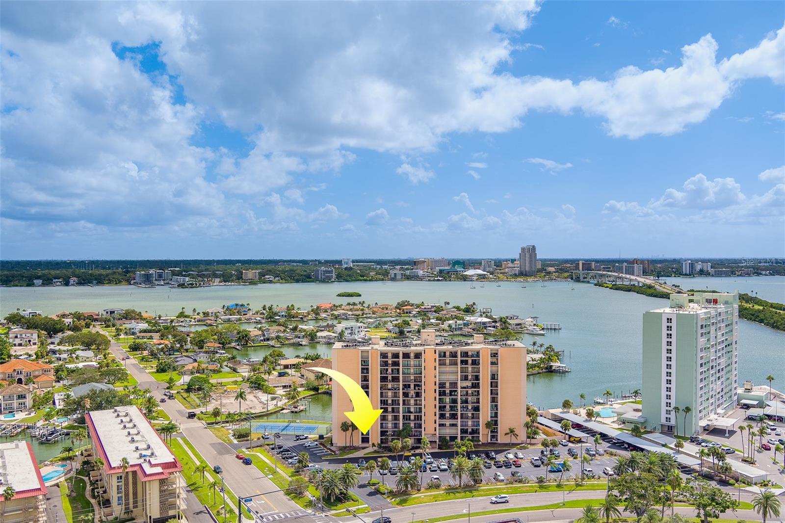 AVAILABLE NOW! Terrific two-bedroom, two full baths, first floor condo on desirable Island Estates. New flooring, refrigerator, dishwasher, fully furnished. Enjoy quiet time and a glass of wine at sunset on your private balcony. Each bedroom and living room all have their own oversized balcony to enjoy. Walk across the street to Island Way Grill for dinner or bike ride to Clearwater's #1 Beach! If you choose to stay back, enjoy some down time just throwing that fishing line in from this waterfront property or just relax and observe the dolphins on our intracoastal waterway. This area has so much to available, just by walking to all services, restaurants, Publix, Post Office, Nail Salon, banks, dry cleaner and so much more. Come stay here at "Champa" Bay!