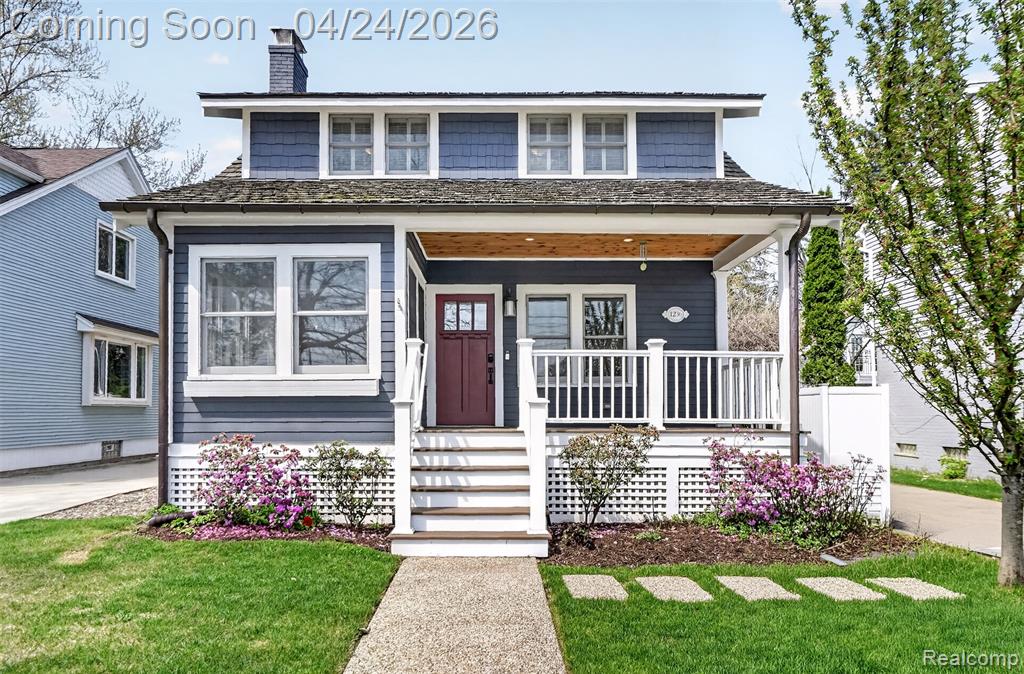 Charming and sophisticated Birmingham home with tremendous curb appeal, artfully balancing classic character with modern refinement. Bathed in natural light, the interiors feature refinished hardwood flooring and thoughtfully curated finishes. The main residence offers three bedrooms and three-and-a-half baths, while a private apartment above the garage—complete with a full bath and bar—provides a versatile flex space ideal for a fourth bedroom, guest retreat, executive office, or fitness studio. Upon entry, a gracious living room with a tiled gas fireplace sets the tone, complemented by an adjacent alcove office and a nearby bar with integrated refrigerator drawers - perfect or entertaining. The heart of the home is an open-concept kitchen featuring polished concrete countertops, premium stainless-steel appliances, and an expansive island. This space flows seamlessly into a spacious family room and a separate dining room. A powder room and a well-appointed mudroom with backyard access complete the main level. The upstairs primary suite serves as a true sanctuary, highlighted by a dramatic peaked ceiling, a walk-in closet, and an adjoining space suitable for a second closet or private office. A striking round picture window adds architectural interest, while the spa-inspired primary bath features dual vanities and a large Euro-style seated shower. Two additional bedrooms and a full bath are also located on the upper level. The finished lower level expands the living space with a generous family room (could also be a 4th bedroom), full bath, laundry area, and abundant storage. Outdoors, a fully fenced backyard with a gated driveway and mature landscaping leads to the detached 2-car garage and apartment suite above. Children's bedrooms, lower level and apartment only are virtually staged.