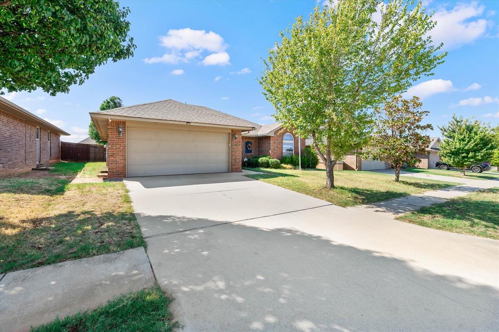 Welcome home to comfort and everyday convenience in Edmond's La Sonata addition! This move-in ready 3-bedroom, 2-bath ranch features wood-look tile throughout the entry and main living areas, with an oversized kitchen and dining space that flow into a welcoming living room with a fireplace. The split-bedroom layout gives the primary suite its own retreat, complete with a private bath and two walk-in closets, while two secondary bedrooms occupy the opposite wing. A standout convenience: the school bus stop is right in front of the home. Simply step outside for pickup, making school-day mornings easier, especially in rainy or wintry weather. Out back, enjoy a fully fenced yard and patio with space to relax, entertain or savor your morning coffee. The water heater was replaced in 2021. La Sonata offers a community pool, pond, recreation center and open green space, with Edmond shopping, dining and everyday essentials just minutes away. Come see how comfortably this home fits your everyday routine! Buyer to verify current school bus routes and stop locations with the district, as these may change.