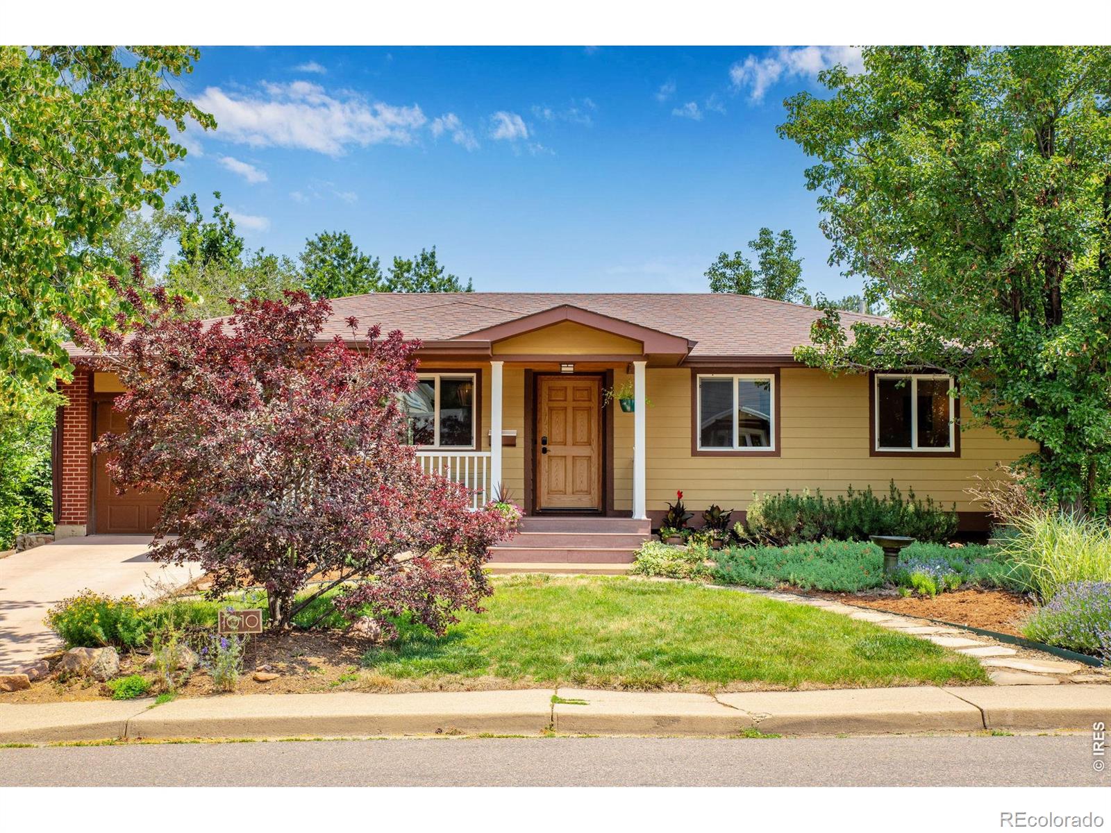 Looking for a very special home in the Table Mesa neighborhood with a front porch view of the Flatirons? This could be the one you've been waiting for. This 5 bedroom, 2 1/2 bath home has been impressively improved over the years, with updates that matter for long-term comfort and efficiency. The main level includes 3 bedrooms, 1 1/2 baths, along with a spacious living, kitchen, and dining area. The kitchen and bathrooms were remodeled with beautiful finishes and excellent storage. The lower level is fully finished with 2 additional bedrooms, a large family room, and exceptional storage space along with laundry. Newer windows, doors, carpeting, Hardie Plank siding, and a Lochinvar on-demand boiler that provides reliable heat and hot water. Cooling is handled by both a mini-split A/C and an evaporative cooler. Garage includes a 240 outlet for those EV's. Outside, the 26x16 Trex deck creates a solid extension of the living space, and the landscaping was designed for privacy, year-round color, and low maintenance. Located in the Table Mesa neighborhood with access to two excellent elementary schools and close to trails, parks, and the Table Mesa shopping center. This just might be your dream home. Please see Additional Remarks for a list of recent upgrades.