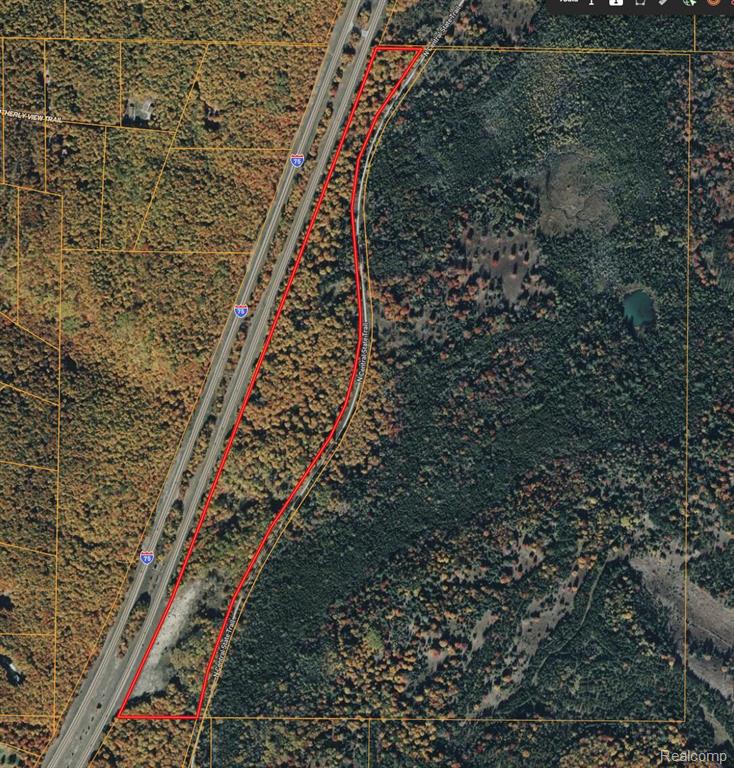 Pristine 69 acre parcel with untouched timber featuring predominantly mature hardwoods, adjacent to expansive state land and the N Central State Trail. This rolling terrain offers exceptional privacy and recreational opportunities with immediate trail access. Low taxes make this a great investment opportunity for timber, hunting, or long-term holding.