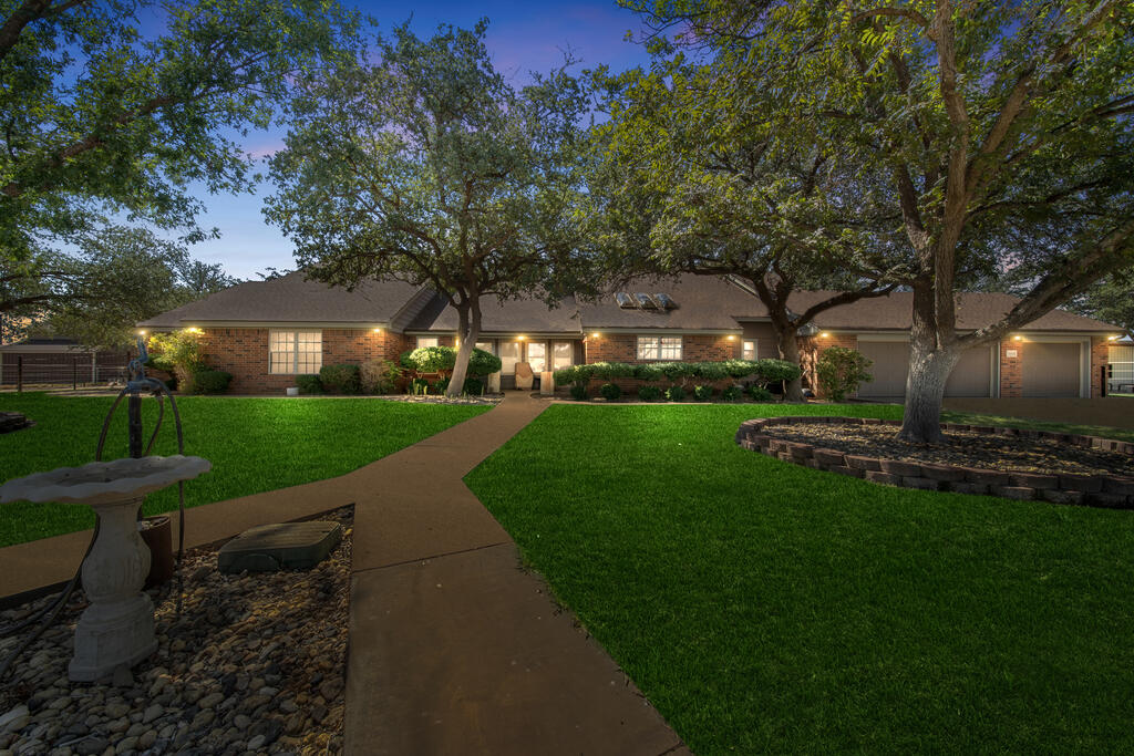 GREENWOOD ISD! One-of-a-kind West Texas estate on 3 acres featuring a 4,200+/- sq ft main home with 7 bedrooms, 4.5 baths, 3-car garage & multiple wood-burning fireplaces. City water + water well, mature trees & irrigation. Massive insulated 50x80 shop with office, 1/2 bath & 3 oversized bays, plus TWO private 1-bedroom, 1-bath apartments! Pipe-fenced pastures, livestock pens, barn, garden, outbuildings & extensive concrete parking. Room to live, entertain, work & play!