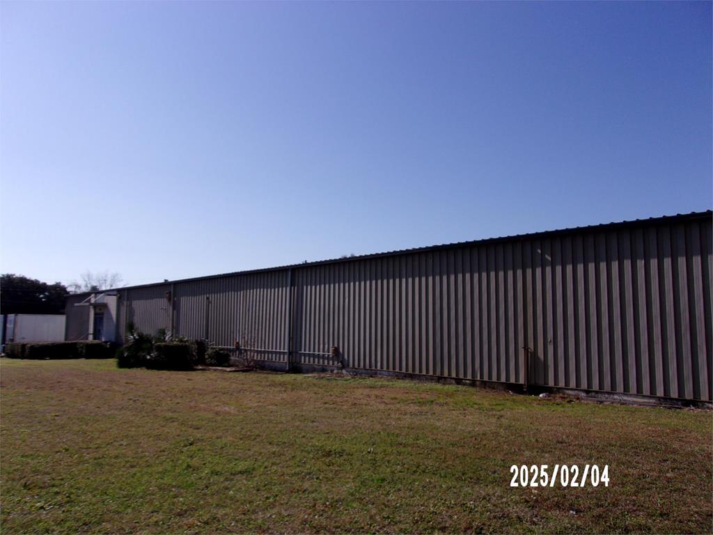 Prime commercial opportunity in the heart of Meigs! This warehouse property at 3075 Carter Street offers versatile space ideal for storage, distribution, manufacturing, or business operations. Featuring a functional layout with ample open space, the building provides flexibility to accommodate a variety of commercial needs. Convenient access to major roadways allows for efficient transportation and logistics. Whether you are expanding your business, investing in commercial real estate, or seeking a secure storage facility, this property presents strong potential. Schedule your private showing today and explore the possibilities this warehouse space has to offer.